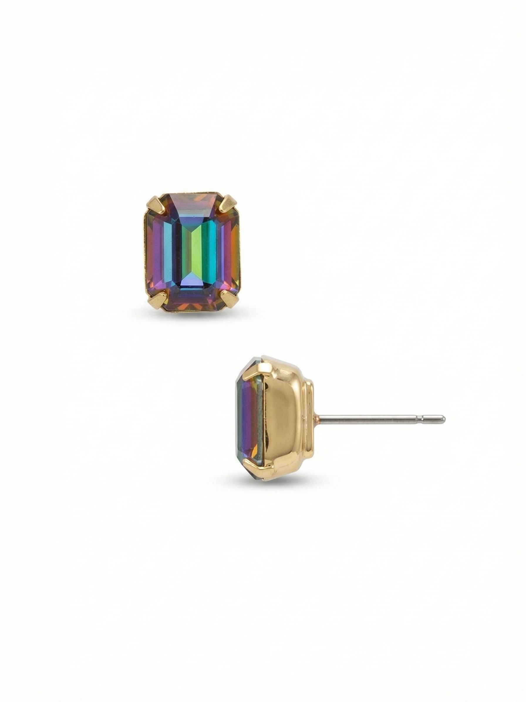 Octavia Stud Earrings - EDU53BGVO - <p>A generously proportioned emerald-cut crystal defines the Octavia Stud. The clean geometry of the stone creates broad planes of deep green, violet, and fiery orange that shift color as you turn your head. Set in substantial bright gold-tone metal, it brings a structured hit of rich color to your daily routine. Because a piece of this scale carries some weight, an oversized comfort clutch is included to keep the earring perfectly positioned and secure from morning to night.</p><ul>
<li>Clean geometry of a single large emerald-cut crystal</li>
<li>Stepped facets maximize the shifting multi-tonal colors</li>
<li>Post with oversized comfort-clutch back</li>
<li>Protective e-coat finish for lasting wear</li>
<li>Includes signature organza pouch for gifting and travel</li>
</ul>