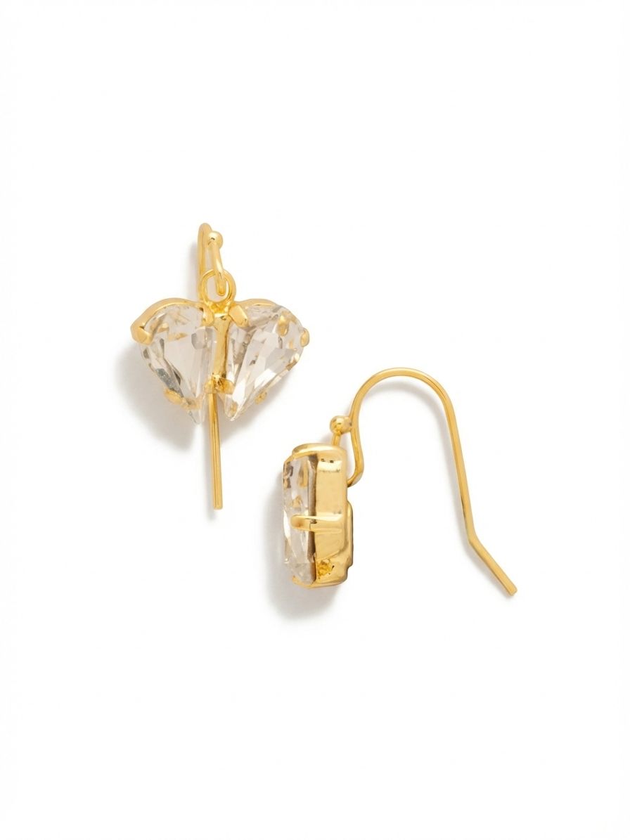 Marlowe Dangle Earrings - EER4BGCRY - <p>Two pear-cut clear crystals meet at the center to create a subtle wing silhouette that catches the light naturally with every step. Anchored by a sleek vertical metal drop, these earrings balance bright illumination with clean, architectural lines. The lightweight wire design ensures continuous comfort and gentle movement throughout the day. At just under an inch long, they deliver a quiet, consistent sparkle that feels entirely effortless to wear.</p><ul>
<li>Paired pear-cut crystals arranged in a distinctive wing silhouette</li>
<li>Sleek vertical metal drop adds modern architectural structure</li>
<li>Fish hook earwire</li>
<li>Protective e-coat finish for lasting wear</li>
<li>Includes signature organza pouch for gifting and travel</li>
</ul>