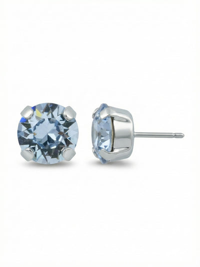 Simple Stud Earrings - EFC99PDLTS - <p>A single round-cut light sapphire crystal brings a clean wash of color to your daily rotation. Scaled just under half an inch, this stud offers quiet presence that reads clearly from across the table. We pair it with an oversized pressure-fit comfort clutch to keep the setting flush and secure, giving you an effortless fit from morning to night.</p><ul>
<li>Single round-cut crystal in a classic four-prong setting</li>
<li>Minimalist profile scaled for daily wear</li>
<li>Post with oversized comfort-clutch back</li>
<li>Protective e-coat finish for lasting wear</li>
<li>Includes signature organza pouch for gifting and travel</li>
</ul>