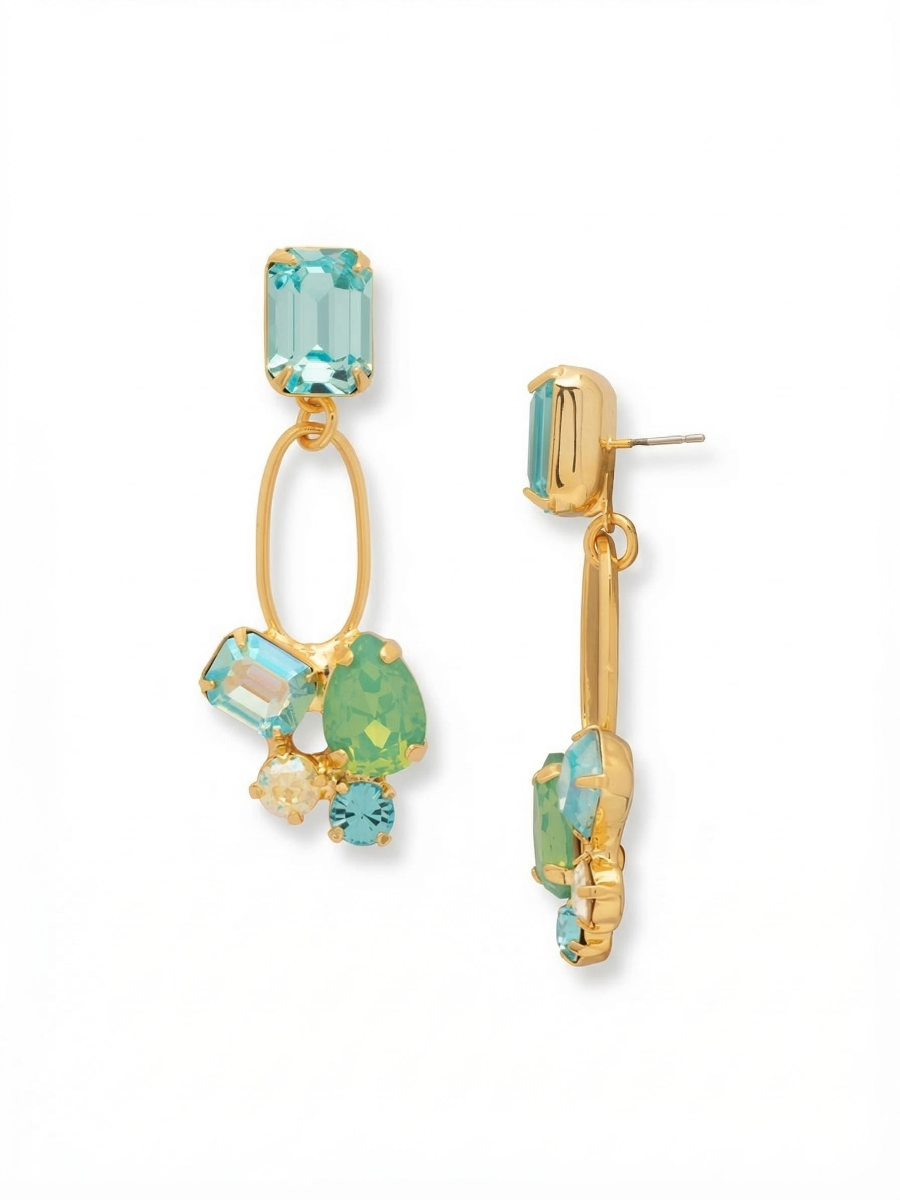 Maude Statement Earrings - EFF77BGCSD - <p>A solitary emerald-cut aquamarine crystal anchors the post, catching the light right at the ear. From there, an open gold-tone loop suspends an asymmetrical cluster of pear and round crystals in shifting shades of sea green and pale blue. The open framework gives these earrings a light, airy movement that balances their substantial length. Because statement pieces need structure, the included oversized comfort back keeps the post secure and upright all day without pulling.</p><ul>
<li>Asymmetrical crystal cluster anchored at the base of an open oval link</li>
<li>Dynamic mix of emerald, pear, and round cuts arranged in an organic layout</li>
<li>Post with oversized comfort-clutch back</li>
<li>Protective e-coat finish for lasting wear</li>
<li>Includes signature organza pouch for gifting and travel</li>
</ul>