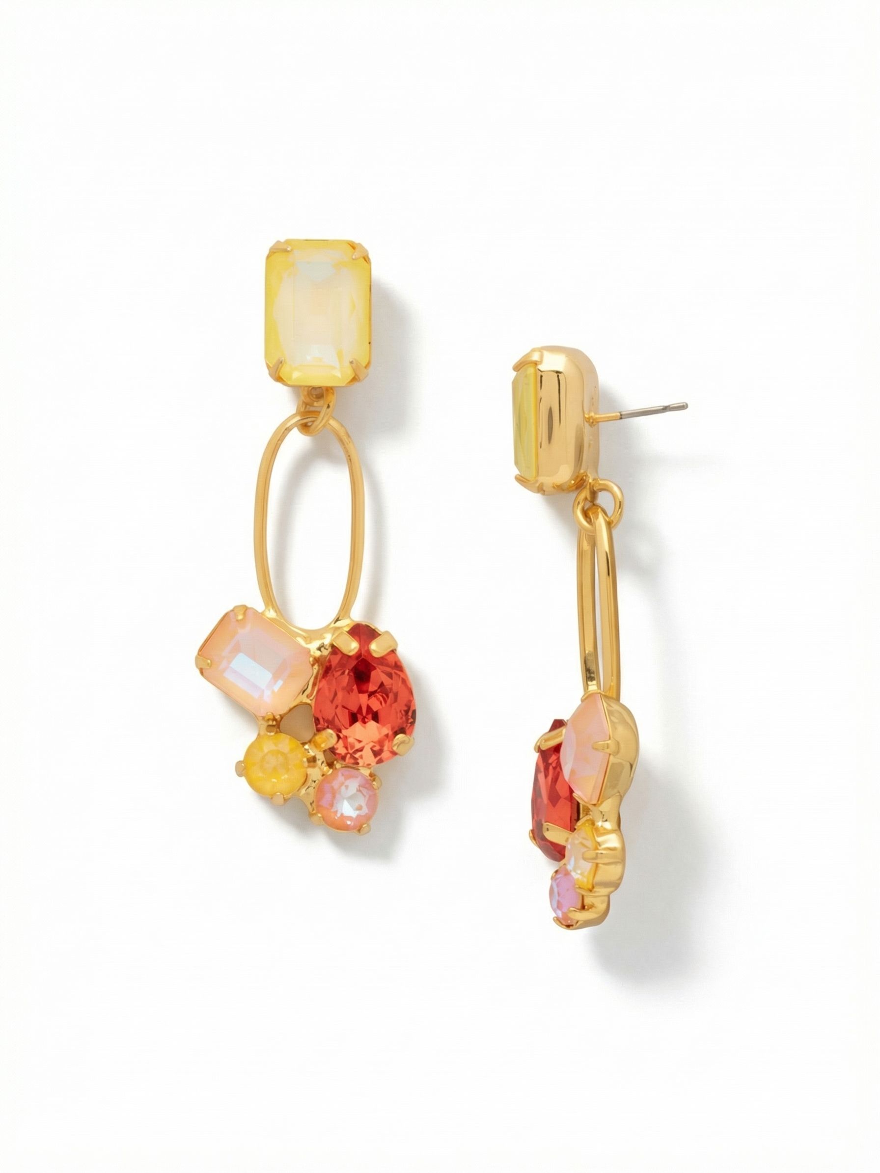 Maude Statement Earrings - EFF77BGMOR - <p>A glowing emerald-cut topaz crystal anchors the design, dropping into an open oval link that creates an airy, swinging movement. Below, an asymmetrical cluster of pear-cut padparadscha and faceted peach stones catches the ambient light as you turn your head. The warm, sunset-inspired palette brings a soft brightness to the skin. To ensure these two-inch drops sit perfectly flat and remain comfortable from morning to evening, they include our oversized pressure-fit backs.</p><ul>
<li>Asymmetrical cluster of mixed crystal cuts</li>
<li>Open oval drop link creates airy movement</li>
<li>Post with oversized comfort-clutch back</li>
<li>Protective e-coat finish for lasting wear</li>
<li>Includes signature organza pouch for gifting and travel</li>
</ul>
