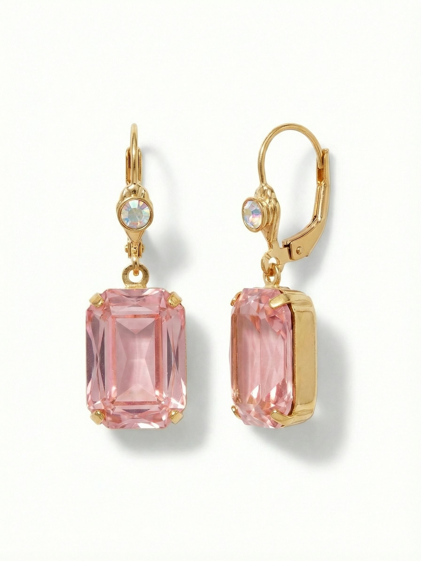 Kathleen Studded Dangle Earrings - EFF80BGPRO - <p>The large emerald-cut crystal suspends gracefully, catching the light with every turn of your head. A single iridescent round stone sits at the base of the secure wire closure, adding a subtle shift of color above the soft rose pink. The bright gold setting frames the substantial rectangular crystal, bringing out its warmth. It feels grounded but moves easily, offering an unbroken flash of color that reads beautifully from across the room.</p><ul>
<li>Substantial emerald-cut crystal profile</li>
<li>Iridescent round accent stone adds subtle color shift</li>
<li>French wire for a smooth, secure fit</li>
<li>Protective e-coat finish for lasting wear</li>
<li>Includes signature organza pouch for gifting and travel</li>
</ul>