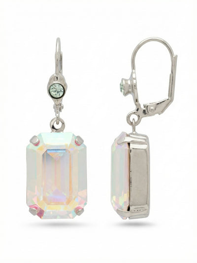 Kathleen Studded Dangle Earrings - EFF80PDCAB - <p>A large emerald-cut crystal catches every shift in the room, casting subtle iridescent tones as you move. Anchored by a solitary cool blue accent stone at the top, the primary crystal swings freely with a satisfying, intentional weight. The secure hinged earwire keeps the piece comfortably in place all day. It offers a bright flash of color and architectural geometry that pairs easily with your natural rotation.</p><ul>
<li>Large emerald-cut crystals offer architectural geometry and bold prismatic color</li>
<li>Subtle round-cut accent stones add a quiet touch of pale blue</li>
<li>French wire for a smooth, secure fit</li>
<li>Protective e-coat finish for lasting wear</li>
<li>Includes signature organza pouch for gifting and travel</li>
</ul>