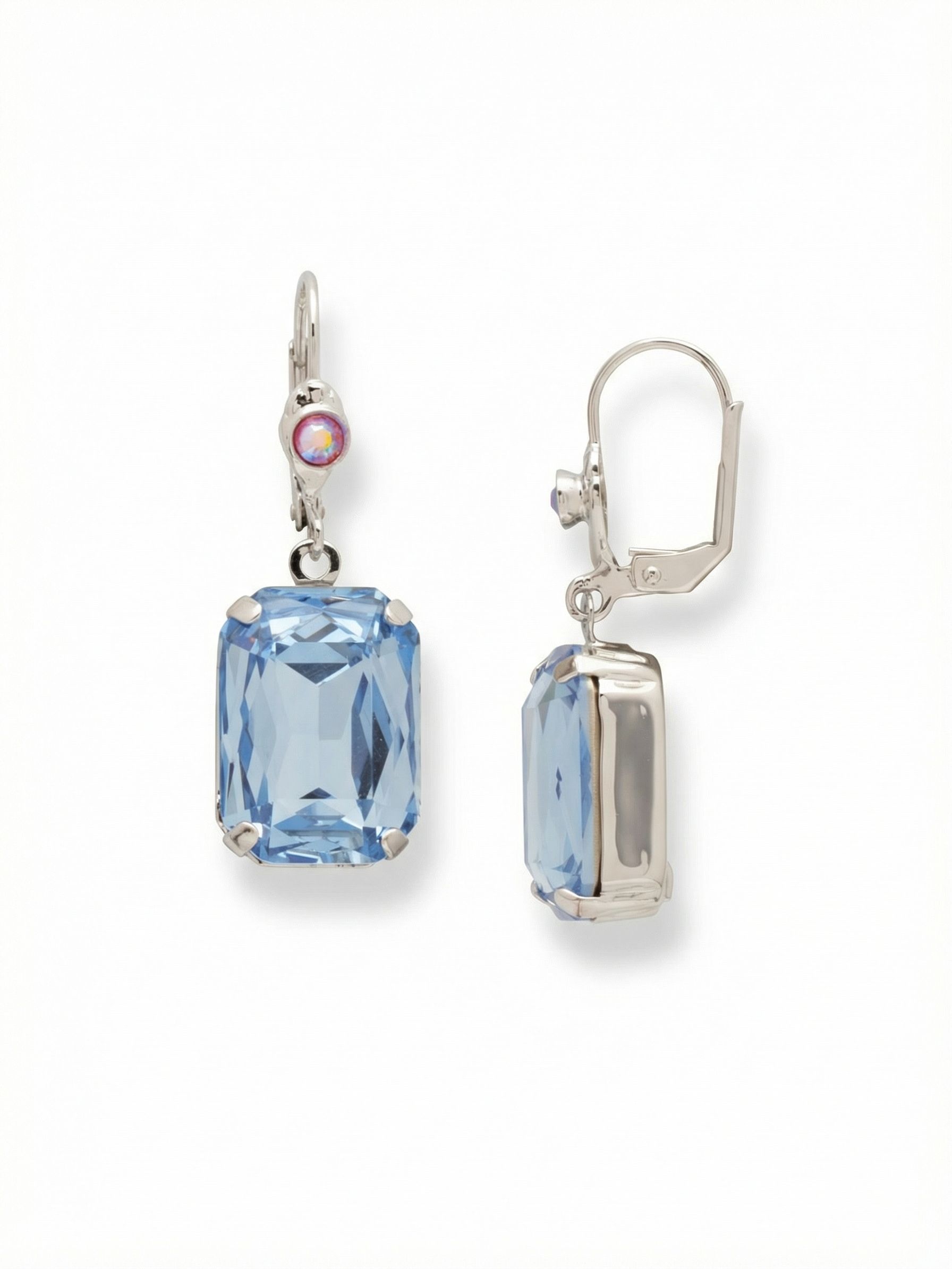 Kathleen Studded Dangle Earrings - EFF80PDPBZ - <p>A single round iridescent crystal rests close to the ear, anchoring a substantial emerald-cut drop that catches the light with every step. The light sapphire stone swings freely below, offering a quiet contrast to the warm pink flash above it. Held securely by a structured wire, this piece brings a balanced weight and fluid motion that feels completely natural to wear from morning to evening.</p><ul>
<li>Emerald-cut drops provide a structured contrast to the round accents</li>
<li>Articulated joints allow the rectangular crystals to catch light in motion</li>
<li>French wire for a smooth, secure fit</li>
<li>Protective e-coat finish for lasting wear</li>
<li>Includes signature organza pouch for gifting and travel</li>
</ul>