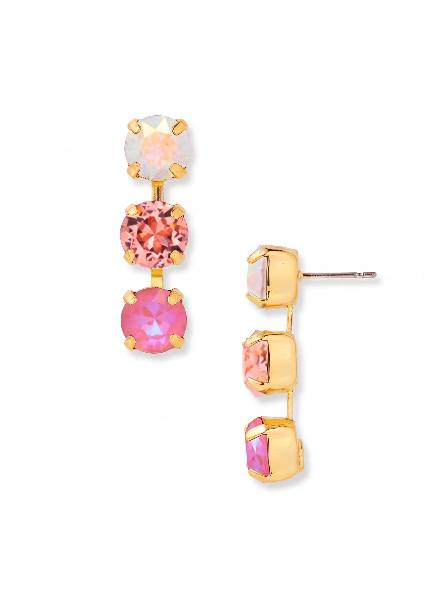 Matilda Triple Dangle Earrings - EFH10BGPIN - <p>Three round-cut crystals form a structured linear drop, moving from an iridescent glow at the top to a vibrant pink at the base. Anchored securely by a post and an oversized comfort clutch, the earring stays perfectly upright. The bottom stones connect via a hidden kette chain, allowing them to swing slightly as you walk while maintaining their sharp vertical line. It brings a calculated rush of color directly to the face.</p><ul>
<li>Linear gradient shifting from iridescent aurora to deep pink</li>
<li>Hidden kette chain construction allows subtle movement in a straight line</li>
<li>Post with oversized comfort-clutch back</li>
<li>Protective e-coat finish for lasting wear</li>
<li>Includes organza pouch for gifting and travel</li>
</ul>