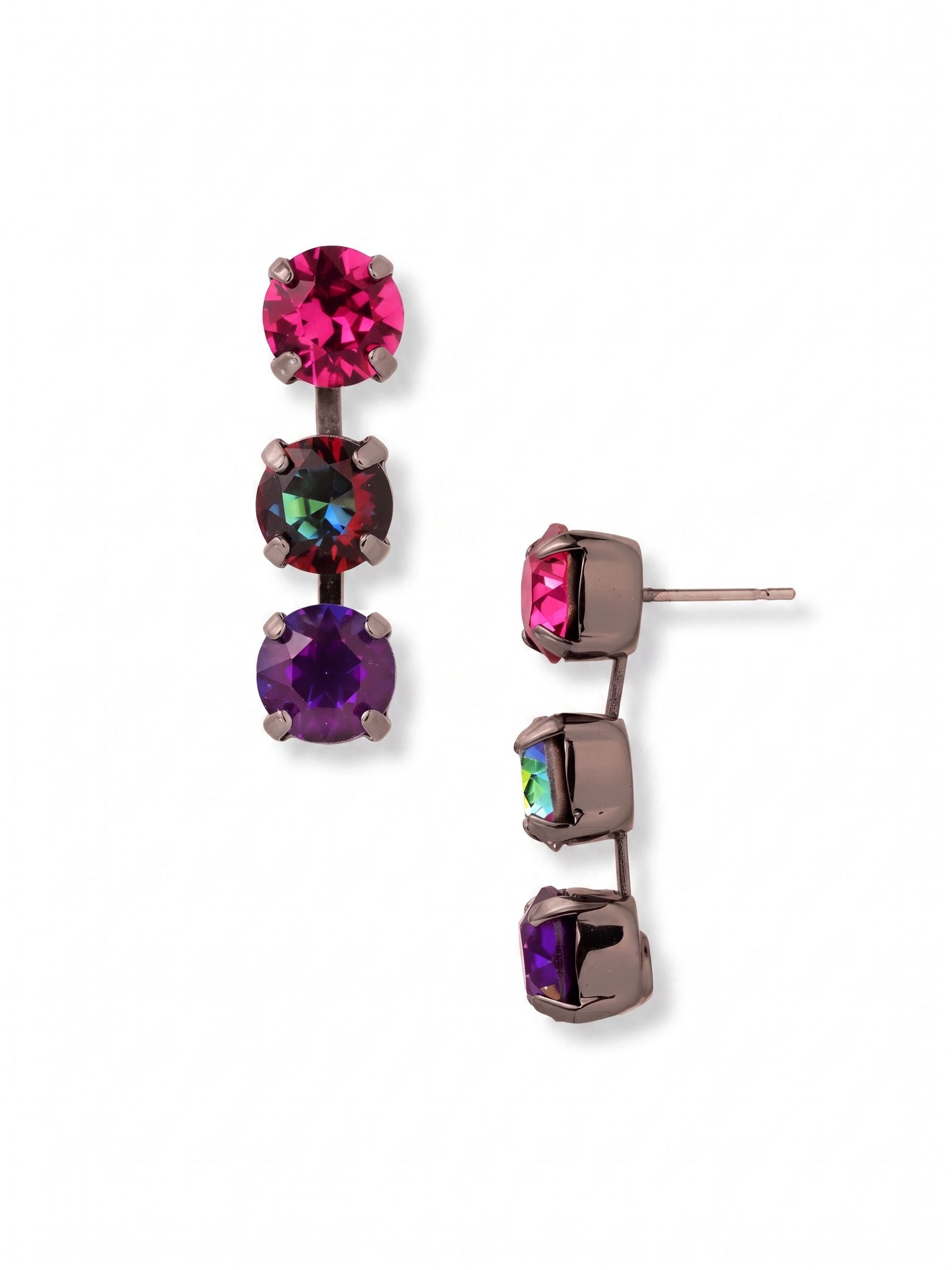 Matilda Triple Dangle Earrings - EFH10GMNNI - <p>Three round crystals form a clean linear drop, transitioning from bright fuchsia to iridescent volcano and deep burgundy. The dark gunmetal setting creates a moody contrast that anchors the rich colors. Built on a flexible channel link, the stones catch the light with subtle, controlled movement as you turn your head. An oversized comfort clutch back ensures the post rests securely, keeping the vertical line perfectly straight all day.</p><ul>
<li>Vertical gradient of deep fuchsia and iridescent round crystals</li>
<li>Articulated channel setting creates fluid linear movement</li>
<li>Post with oversized comfort-clutch back</li>
<li>Includes organza pouch for gifting and travel</li>
</ul>