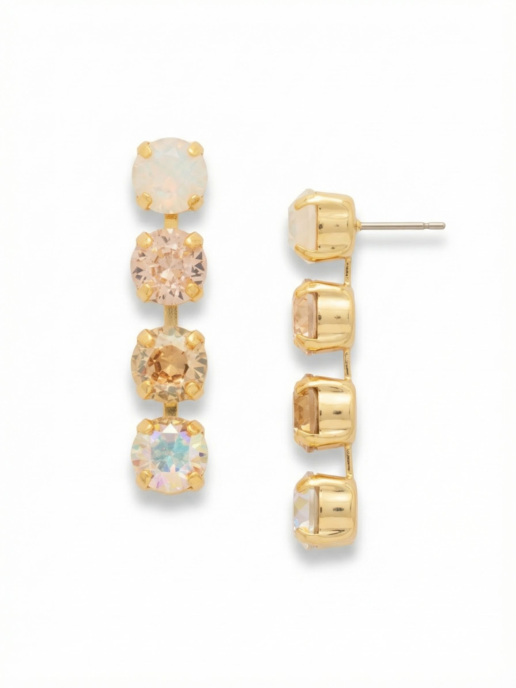 Matilda Dangle Earrings - EFH1BGGGO - <p>A linear drop of four round-cut crystals creates a continuous line of light that sways naturally as you move. Set in an articulated channel chain, the stones transition through soft, shifting tones from clear crystal to vintage rose and warm golden shadow. At an inch and a half long, the scale brings visible movement to the face, while the oversized comfort back keeps the post securely anchored and balanced all day.</p><ul>
<li>Linear silhouette formed by an articulated channel chain</li>
<li>Subtle gradient of shifting warm and iridescent crystal tones</li>
<li>Post with oversized comfort-clutch back</li>
<li>Protective e-coat finish for lasting wear</li>
<li>Includes signature organza pouch for gifting and travel</li>
</ul>