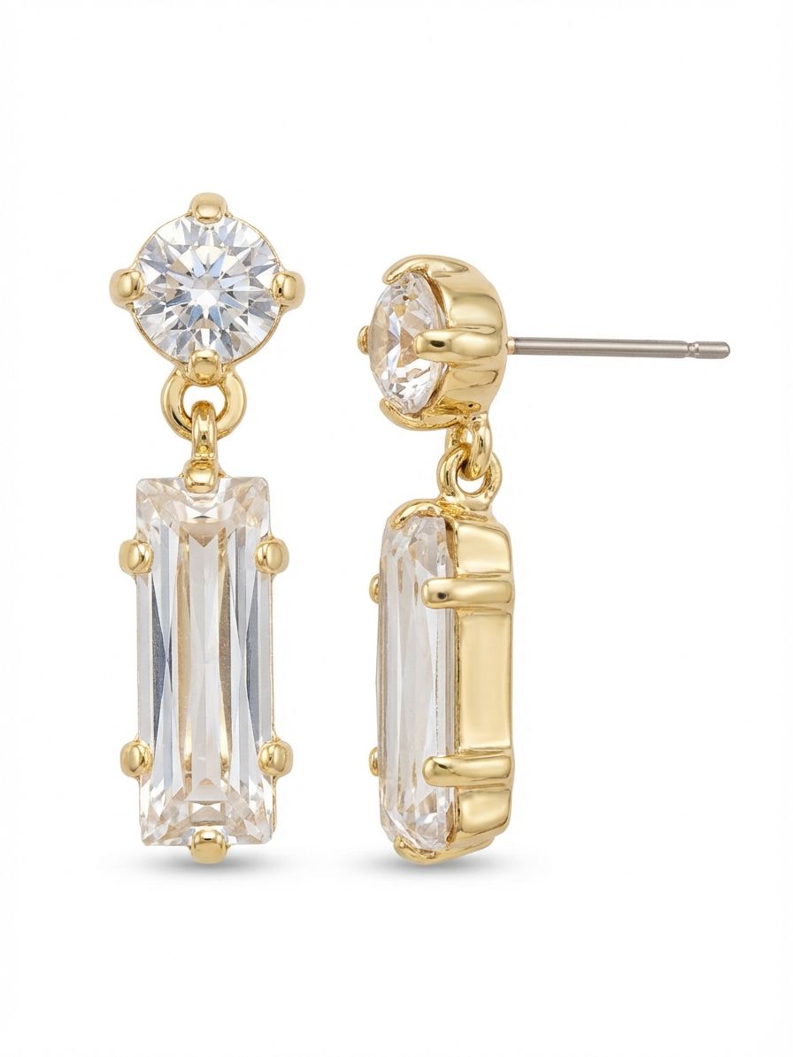 Bindi Studded Dangle Earrings - EFL13BGCRY - <p>A round crystal anchors this earring, casting brilliant light right near the face. Below it, a single baguette-cut drop swings freely on a small hinge. The combination of brilliant and step cuts creates a subtle, shifting play of light as you move through your day. At exactly one inch long, the scale feels substantial but incredibly easy to wear. An oversized comfort clutch keeps the top post secure and perfectly positioned from morning until night.</p><ul>
<li>Contrasting round and baguette crystal cuts create dynamic light reflection</li>
<li>Articulated hinge allows the geometric drop to swing freely</li>
<li>Post with oversized comfort-clutch back</li>
<li>Protective e-coat finish for lasting wear</li>
<li>Includes signature organza pouch for gifting and travel</li>
</ul>