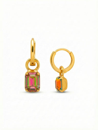 Mini Emerald Huggie Hoop Earrings - EFM13BGVO - <p>A polished gold hoop rests comfortably close to the ear, grounding a single emerald-cut crystal that sways below. The free-moving drop catches the light with every subtle turn of the head, revealing a complex shift of magenta, green, and gold tones. Finished with a secure, seamless huggie closure, these compact earrings deliver an unexpected touch of iridescent color in a lightweight profile designed for all-day wear.</p><ul>
<li>Single emerald-cut crystal drop suspended from a polished hoop</li>
<li>Articulated jump ring allows the iridescent stone continuous subtle movement</li>
<li>Huggie hoop with click-shut closure</li>
<li>Protective e-coat finish for lasting wear</li>
<li>Includes signature organza pouch for gifting and travel</li>
</ul>