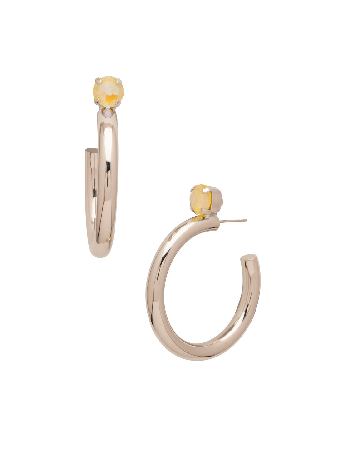 Keeley Studded Hoop Earrings - EFP26PDLTD - <p>Elevate your look with the Keeley Studded Hoop Earrings, a dazzling accessory that commands attention. Featuring: a sparkling crystal stud embellishment, a sleek durable metal hoop, and a secure post-back closure From Sorrelli's Light Topaz Delite collection in our Palladium finish.</p>