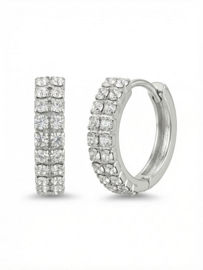 Double Crystal Huggie Hoop Earrings - EFS31PDCRY - <p>Two parallel rows of clear crystals catch the light with every subtle turn of the head. This compact hoop curves closely around the ear, delivering a structured double band of brilliance that feels entirely weightless. The hinged design snaps securely into place, offering an effortless wearing experience from morning until evening. It brings a continuous line of reflection that adds polished texture right next to the face.</p><ul>
<li>Twin rows of closely set crystals create a continuous band of structured light</li>
<li>Compact profile designed to trace the natural curve of the ear</li>
<li>Hinged hoop with click-shut closure</li>
<li>Protective e-coat finish for lasting wear</li>
<li>Includes signature organza pouch for gifting and travel</li>
</ul>