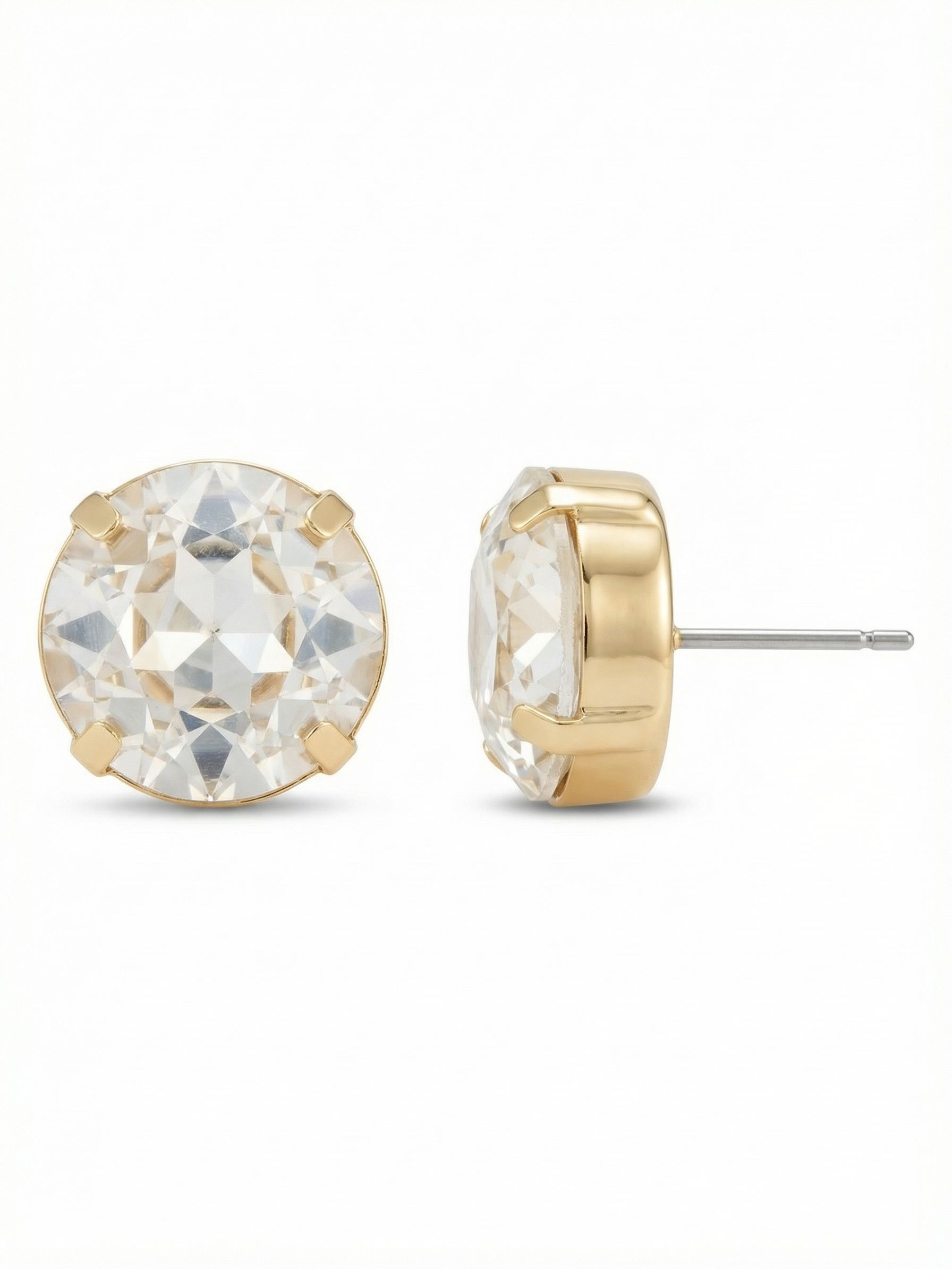 Kelly Stud Earrings - EFT110BGCRY - <p>A single, substantial round-cut clear crystal anchors these classic studs. At over half an inch across, the faceted stones gather and reflect light, giving them enough presence to read clearly from across a room. They sit close to the ear, held securely in a deep four-prong setting. Because of their impressive scale, an oversized comfort clutch keeps the weight balanced and prevents tipping, ensuring they stay perfectly positioned throughout the day.</p><ul>
<li>Oversized single-stone solitaire design</li>
<li>Deep profile setting with four prongs</li>
<li>Post with oversized comfort-clutch back</li>
<li>Protective e-coat finish for lasting wear</li>
<li>Includes signature organza pouch for gifting and travel</li>
</ul>