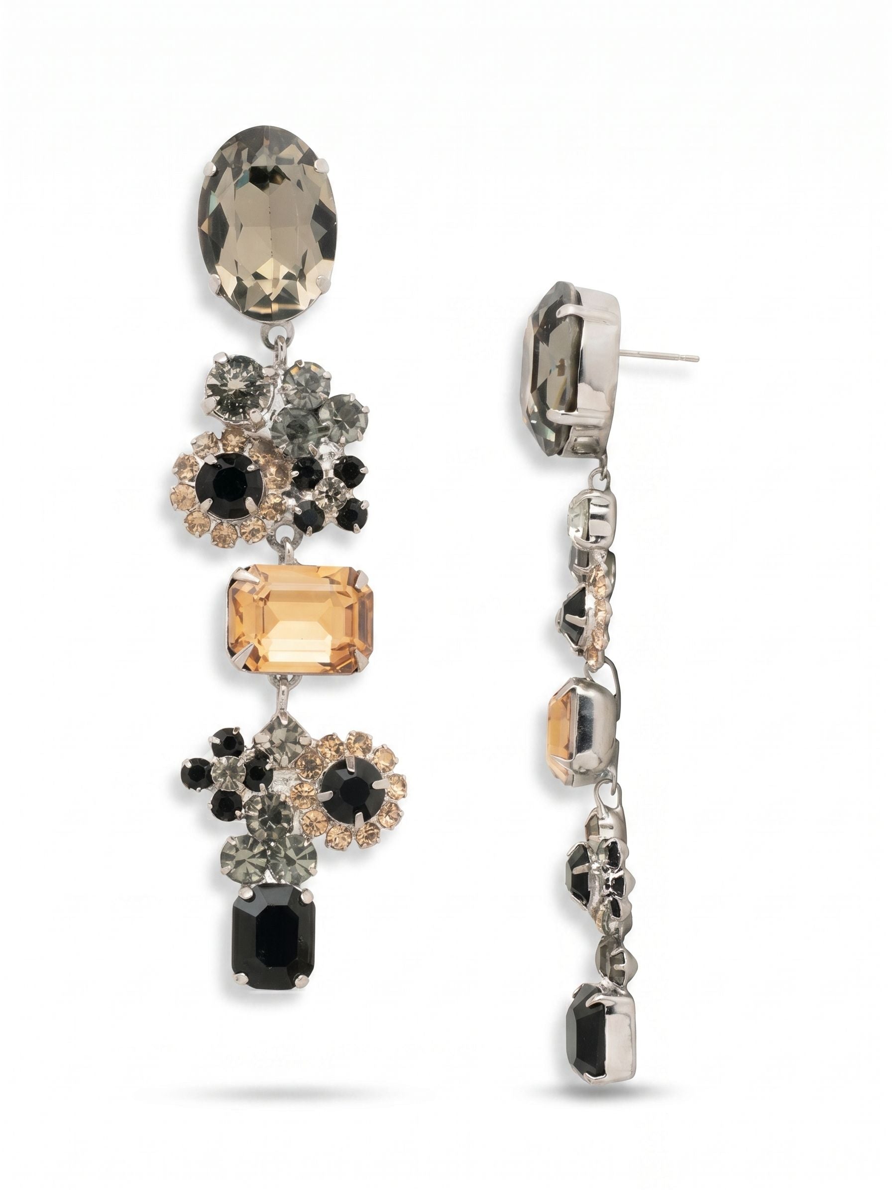 Claire Statement Earrings - EFT333PDEM - <p>The Claire Statement Earrings feature a stunning design with a single oval-cut crystal at the top, gracefully leading to a fancy crystal-embellished floral cluster and a striking emerald-cut crystal. Additional floral clusters and a petite emerald-cut crystal at the bottom create a captivating elongated effect that adds elegance and sophistication to any look. From Sorrelli's Evening Moon collection in our Palladium finish.</p>