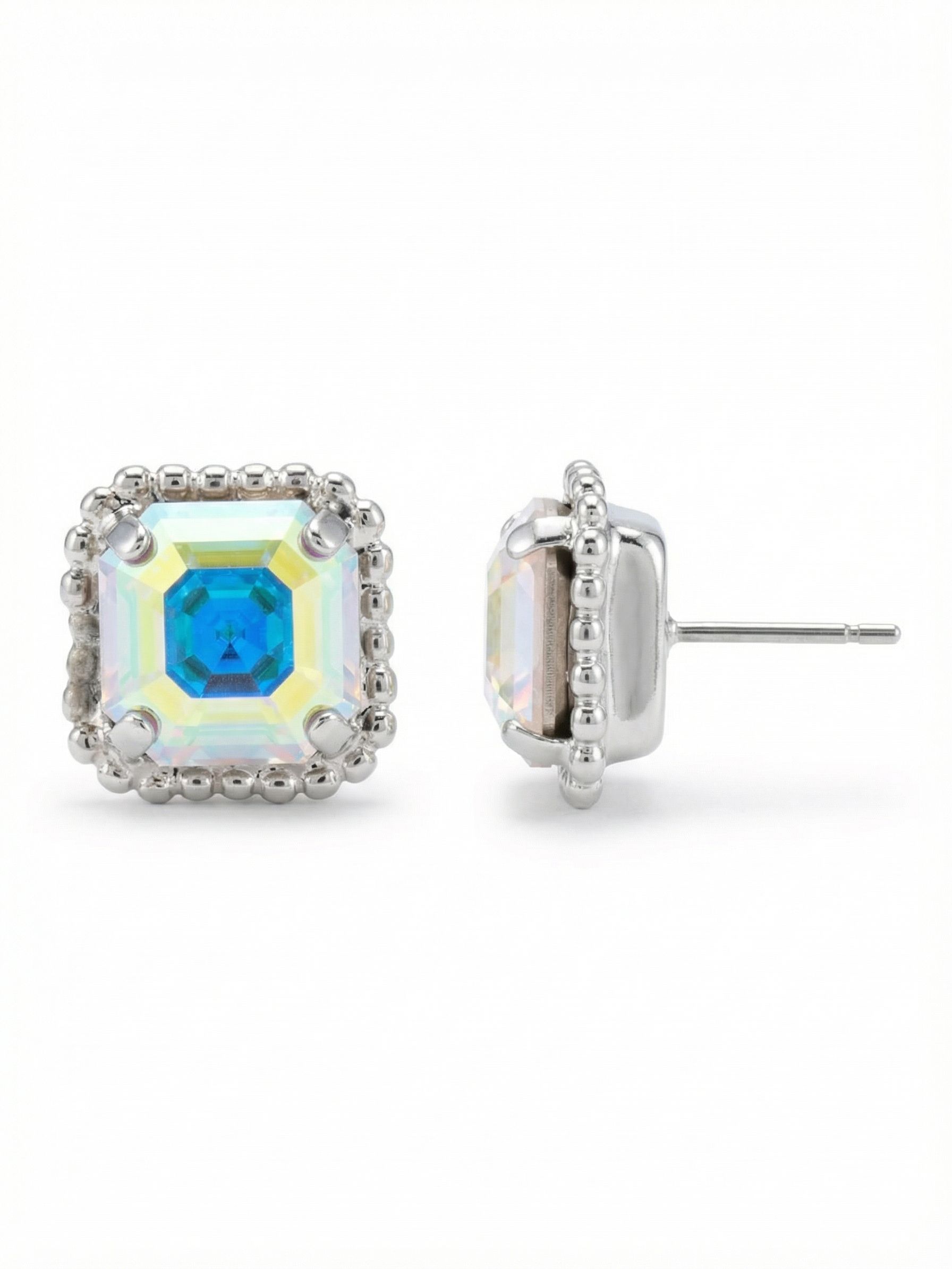 Izzy Decorated Stud Earrings - EFY2PDCAB - <p>A single ten-millimeter square crystal catches the light, framed by a delicate border of metal ball chain. These half-inch studs offer enough scale to register clearly from across a table, while the iridescent Aurora Borealis finish shifts through subtle prisms of color as your head turns. An oversized comfort clutch secures the post, ensuring the setting stays flush and perfectly balanced from morning to night.</p><ul>
<li>Singular square-cut crystal framed by a textural ball chain border</li>
<li>Iridescent color shifts provide quiet impact at conversation distance</li>
<li>Post with oversized comfort-clutch back</li>
<li>Protective e-coat finish for lasting wear</li>
<li>Includes signature organza pouch for gifting and travel</li>
</ul>