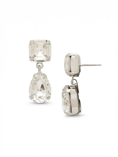 Clara Dangle Earrings - EFY4PDCRY - <p>A study in shape and light, these drop earrings pair crisp, square-cut crystal posts with softly faceted pear-shaped drops. The minimal articulated link allows the lower crystal to swing gently with your movement, catching reflections throughout the day. At three-quarters of an inch long, they deliver focused brightness without feeling heavy. An oversized comfort clutch back anchors the post securely, ensuring the geometric silhouette stays perfectly positioned from morning meetings to evening dinners.</p><ul>
<li>Crisp square top crystals contrast sharply with softly curved pear drops</li>
<li>A single articulated link allows the lower crystal to catch continuous light in motion</li>
<li>Post with oversized comfort-clutch back</li>
<li>Protective e-coat finish for lasting wear</li>
<li>Includes signature organza pouch for gifting and travel</li>
</ul>