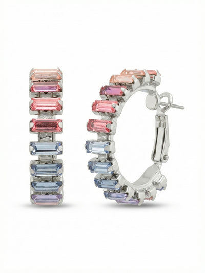 Bianca Hoop Earrings - EFY55PDPBZ - <p>A structured take on a classic silhouette. The Bianca Hoop sets a continuous line of baguette-cut crystals in a clean channel, building a sharp band of color that shifts from warm rose to cool sapphire. At exactly one inch in length, these hoops find the balance between daily wearability and distinct visual presence. The secure lever-back closure clicks comfortably into place, keeping the linear light reflections steady as you move through your afternoon.</p><ul>
<li>Continuous channel setting creates a seamless transition of color</li>
<li>Linear baguette crystals offer sharp geometric light reflection</li>
<li>Lever back closure for all-day secure wear</li>
<li>Protective e-coat finish for lasting wear</li>
<li>Includes signature organza pouch for gifting and travel</li>
</ul>