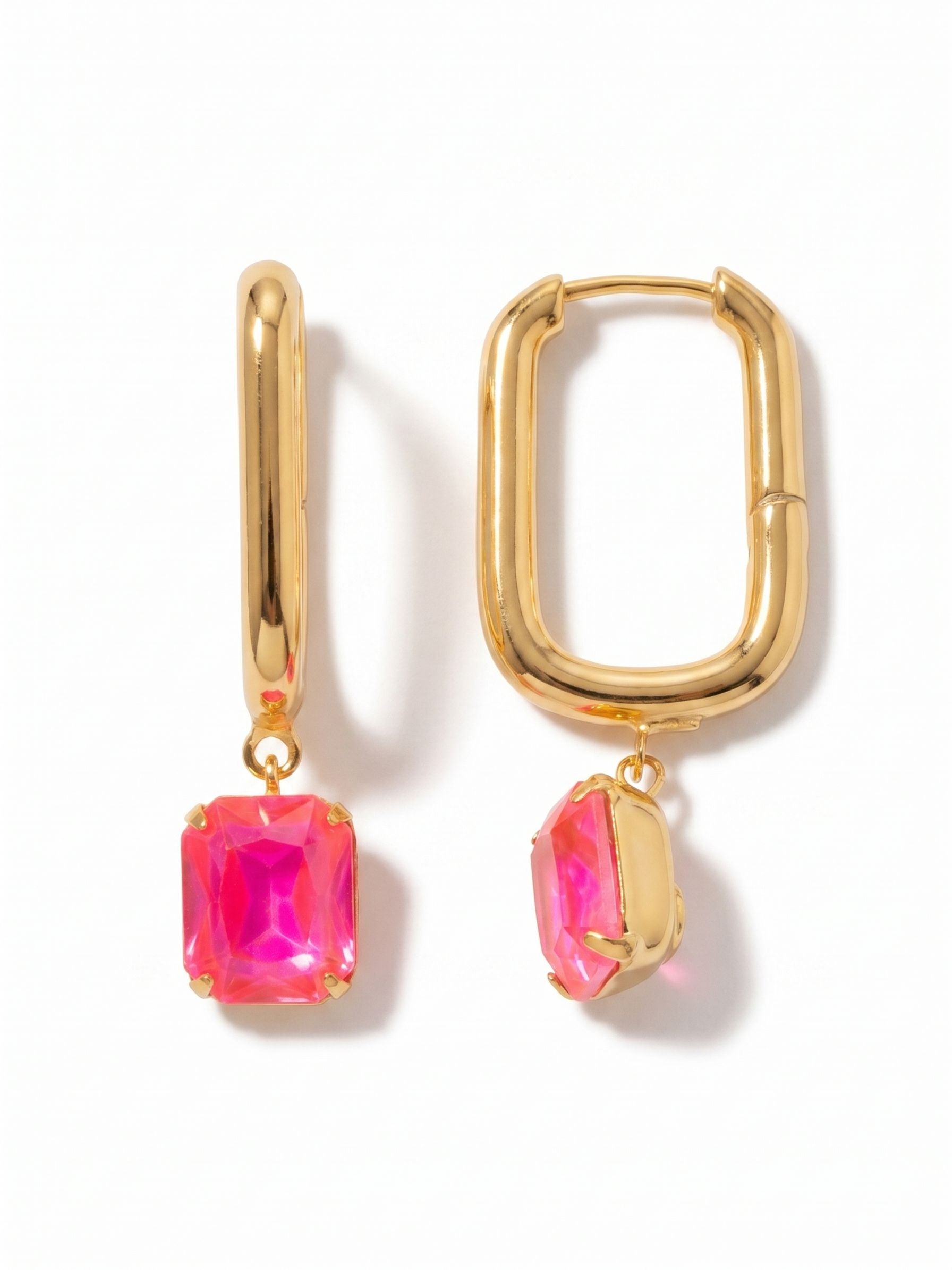 Octavia Rectangle Hoop Earrings - EFY7BGETP - <p>Sharp, clean lines define this modern take on the classic drop earring. An elongated, geometric hoop mirrors the sharp facets of the emerald-cut crystal suspended just below, creating a continuous architectural shape. The vivid pink stone moves freely on its loop, catching the light as you turn your head. Resting comfortably with a balanced weight that feels substantial without pulling, it offers a thoughtful pairing of bold color and disciplined design for your daily rotation.</p><ul>
<li>Elongated geometric hoop mirrors the sharp lines of the emerald-cut drop</li>
<li>Suspended crystal setting provides continuous movement and light reflection</li>
<li>Hinged hoop with click-shut closure</li>
<li>Protective e-coat finish for lasting wear</li>
<li>Includes signature organza pouch for gifting and travel</li>
</ul>