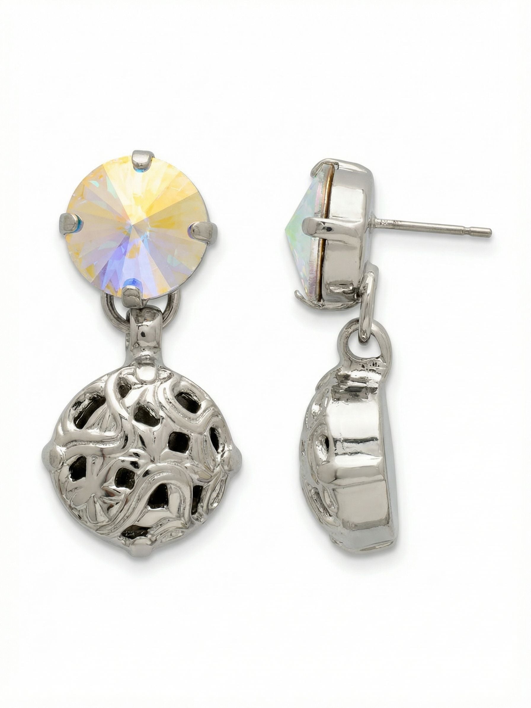 Clementine Round Dangle Earrings - EFZ188PDCAB - <p>A large iridescent round crystal anchors this design, casting shifting flashes of pink and blue as light catches the Aurora Borealis stone. Suspended below, a sculpted filigree metal drop sways gently with your movement. The cool palladium finish and delicate filigree add rich visual texture while keeping the piece remarkably lightweight. To ensure the substantial top post stays perfectly upright and secure from morning to evening, it is paired with an oversized comfort clutch back.</p><ul>
<li>Intricate filigree metal drop suspended beneath a large faceted crystal</li>
<li>Iridescent round stone casts shifting spectral colors in the light</li>
<li>Post with oversized comfort-clutch back</li>
<li>Protective e-coat finish for lasting wear</li>
<li>Includes signature organza pouch for gifting and travel</li>
</ul>