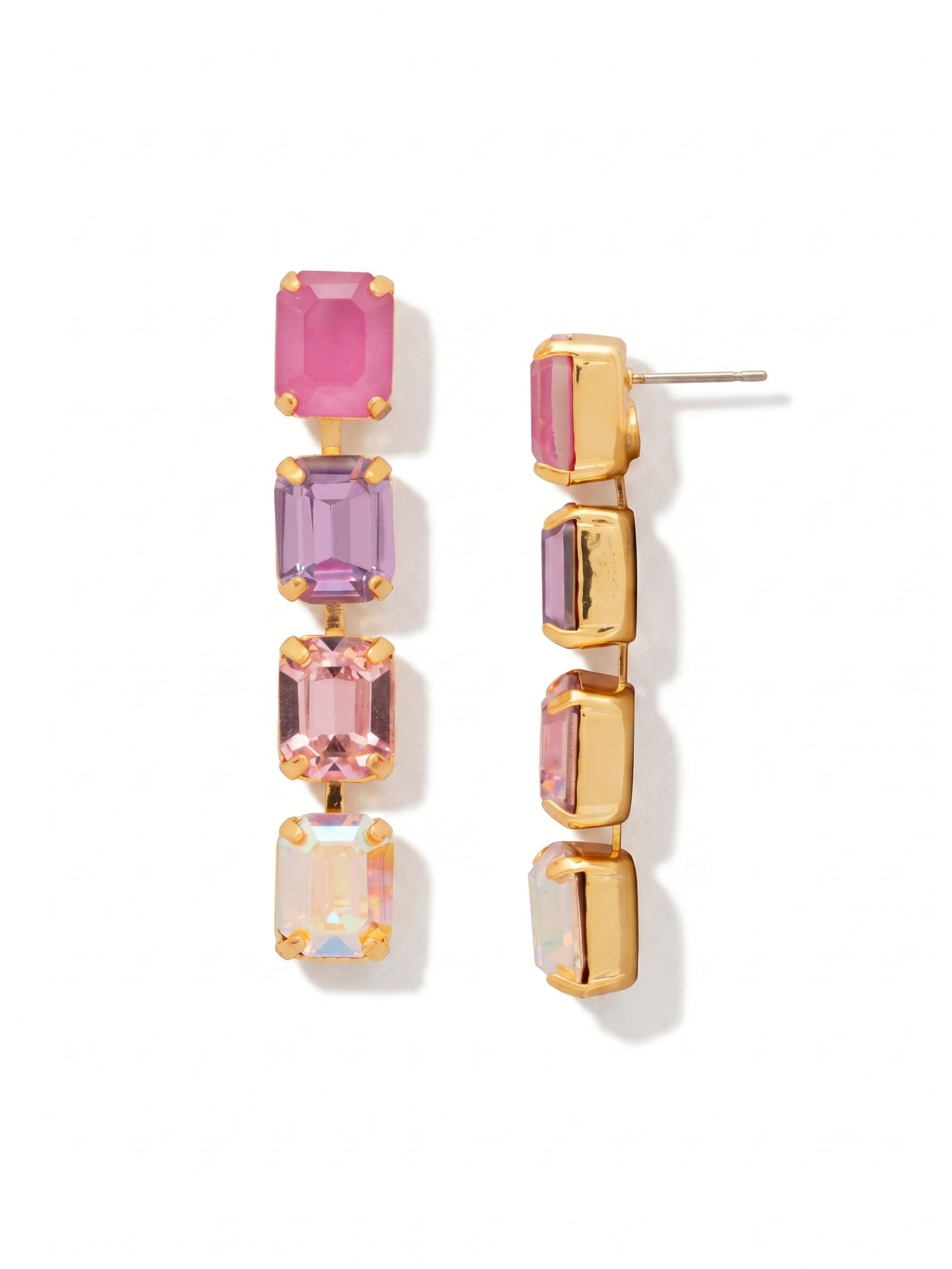Octavia Repeating Dangle Earrings - EFZ6BGPRO - <p>Four cleanly faceted emerald-cut crystals cascade in a straight, fluid line. The color progression shifts from a deep, saturated pink down through soft violet and pale rose, finishing with a prismatic aurora borealis crystal that catches the light as you move. A specialized kette chain construction allows the two-inch drop to sway gently without twisting. An oversized comfort back holds the post securely, ensuring the vertical silhouette stays perfectly aligned and balanced all day.</p><ul>
<li>Four perfectly matched emerald-cut crystals form a clean linear silhouette</li>
<li>Linked channel construction allows the crystals to sway while remaining forward-facing</li>
<li>Post with oversized comfort-clutch back</li>
<li>Protective e-coat finish for lasting wear</li>
<li>Includes signature organza pouch for gifting and travel</li>
</ul>