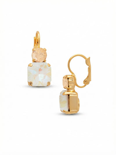 Kimber Dangle Earrings - EGB2BGGGO - <p>A gentle French wire closure allows these one-inch drops to sway softly with your movement. Warm, round golden shadow crystals sit right above iridescent square-cut stones, creating a structured yet fluid play of light. The bright setting highlights the radiant palette, making this an easy pair to reach for on a Tuesday morning or a quiet dinner out. They bring a subtle, confident illumination to the face without demanding attention.</p><ul>
<li>Contrasting round and square crystal cuts create a structured profile</li>
<li>Iridescent white accents balance warm golden shadow stones</li>
<li>Hook drop for easy, lightweight wear</li>
<li>Protective e-coat finish for lasting wear</li>
<li>Includes signature organza pouch for gifting and travel</li>
</ul>