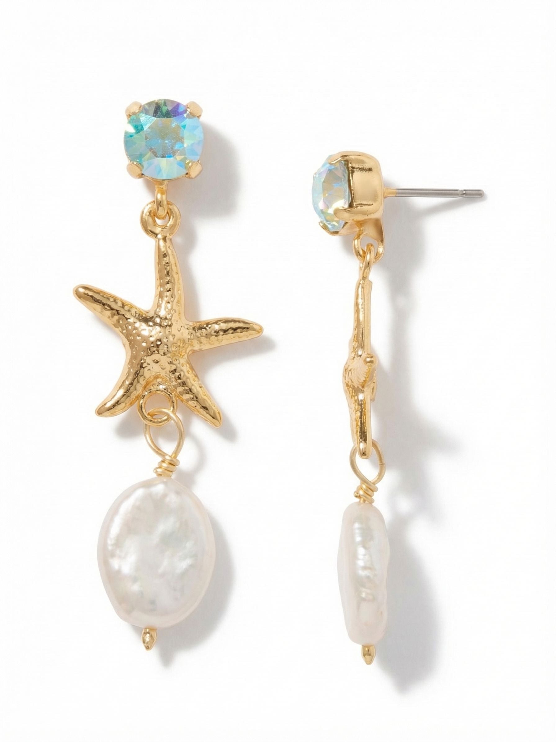 Starfish Pearl Dangle Earrings - EGE11BGCSD - <p>An iridescent aquamarine crystal sits cleanly at the post, anchoring a fluid two-inch drop. A textured starfish charm links the top crystal to a flat oval pearl bead, creating a double-jointed design that swings freely as you move. The interplay of bright metal, soft pearl luster, and faceted glass brings a refined coastal feel to everyday wear. While the length offers noticeable presence, a lightweight build and an oversized comfort clutch keep the fit secure from morning to evening.</p><ul>
<li>Three-tiered design mixing faceted crystal, textured metal, and a flat pearl bead</li>
<li>Articulated links allow the charms to swing freely with your movement</li>
<li>Post with oversized comfort-clutch back</li>
<li>Protective e-coat finish for lasting wear</li>
<li>Includes signature organza pouch for gifting and travel</li>
</ul>