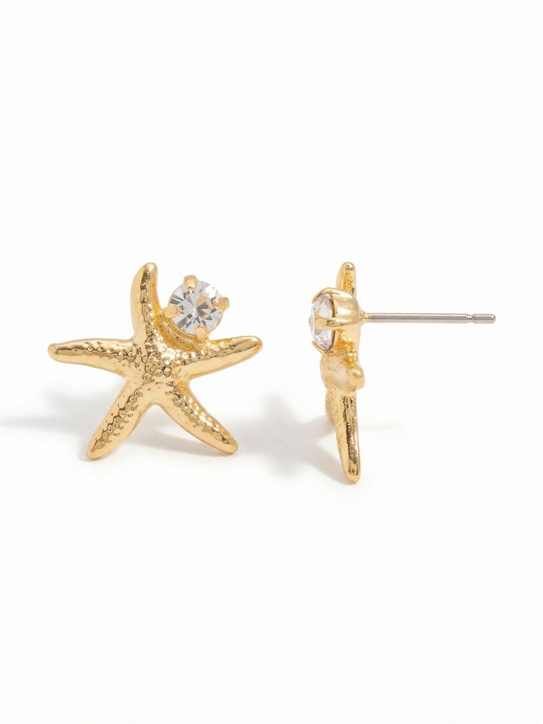 Starfish Stud Earrings - EGE14BGCRY - <p>A textured bright gold finish gives this starfish design a tactile, dimensional look. A single round-cut clear crystal rests near the upper arm to provide a subtle glint at conversation distance. Scaled for effortless daily wear, these studs include an oversized comfort clutch to keep them sitting securely on the ear all day.</p><ul>
<li>Textured starfish base with subtle dimensional detailing</li>
<li>Asymmetrical round-cut crystal accent near the upper point</li>
<li>Post with oversized comfort-clutch back</li>
<li>Protective e-coat finish for lasting wear</li>
<li>Includes signature organza pouch for gifting and travel</li>
</ul>