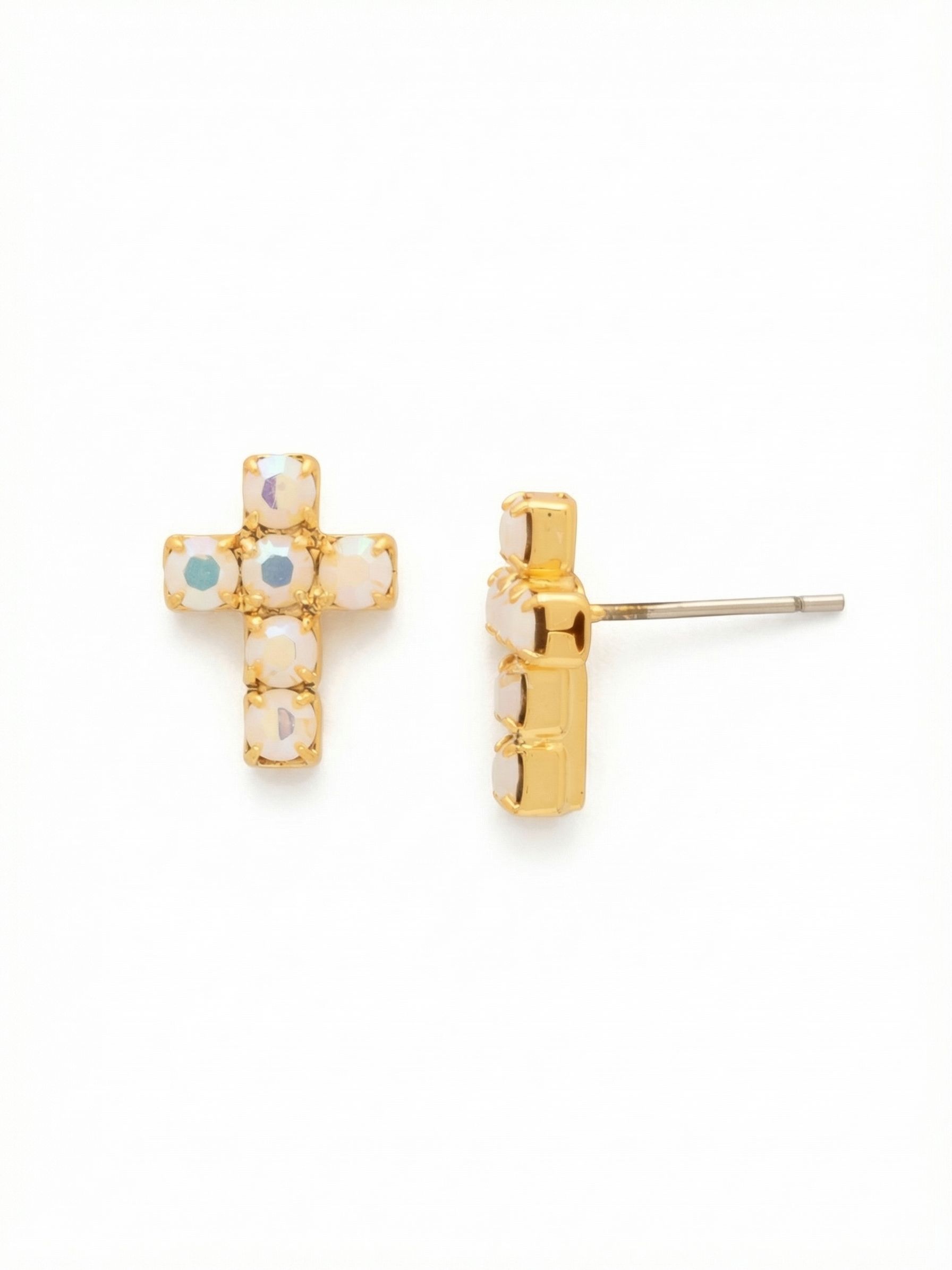 Carly Cross Stud Earrings - EGE88BGWAB - <p>At just half an inch long, these cross studs offer a subtle but deliberate presence. The milky alabaster stones catch the light with an iridescent shift that reads softly from across a room. Designed to sit securely and close to the skin, they include an oversized comfort clutch back to ensure they stay balanced all day without tilting. It is a quiet, familiar silhouette with enough reflective movement to become a daily signature.</p><ul>
<li>Classic cross silhouette built from tightly arranged round crystals</li>
<li>Milky alabaster stones with an iridescent light-shifting finish</li>
<li>Post with oversized comfort-clutch back</li>
<li>Protective e-coat finish for lasting wear</li>
<li>Includes signature organza pouch for gifting and travel</li>
</ul>