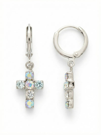 Carly Cross Huggie Hoop Earrings - EGE8PDRQ - <p>Balancing the security of a classic huggie with the gentle swing of a pendant, these drop earrings wear light and easy. The cross charm is constructed from round-cut crystals in soft, opalescent shades of pale blue and clear quartz that shift gently in the light. Suspended just below the ear, the one-and-a-half-inch profile offers quiet daytime presence without weighing you down, making it an effortless addition to your daily rotation.</p><ul>
<li>Soft pastel palette of opalescent and clear round-cut crystals</li>
<li>Subtle pendant movement suspended from a structured crystal cross</li>
<li>Huggie hoop with click-shut closure</li>
<li>Protective e-coat finish for lasting wear</li>
<li>Includes signature organza pouch for gifting and travel</li>
</ul>