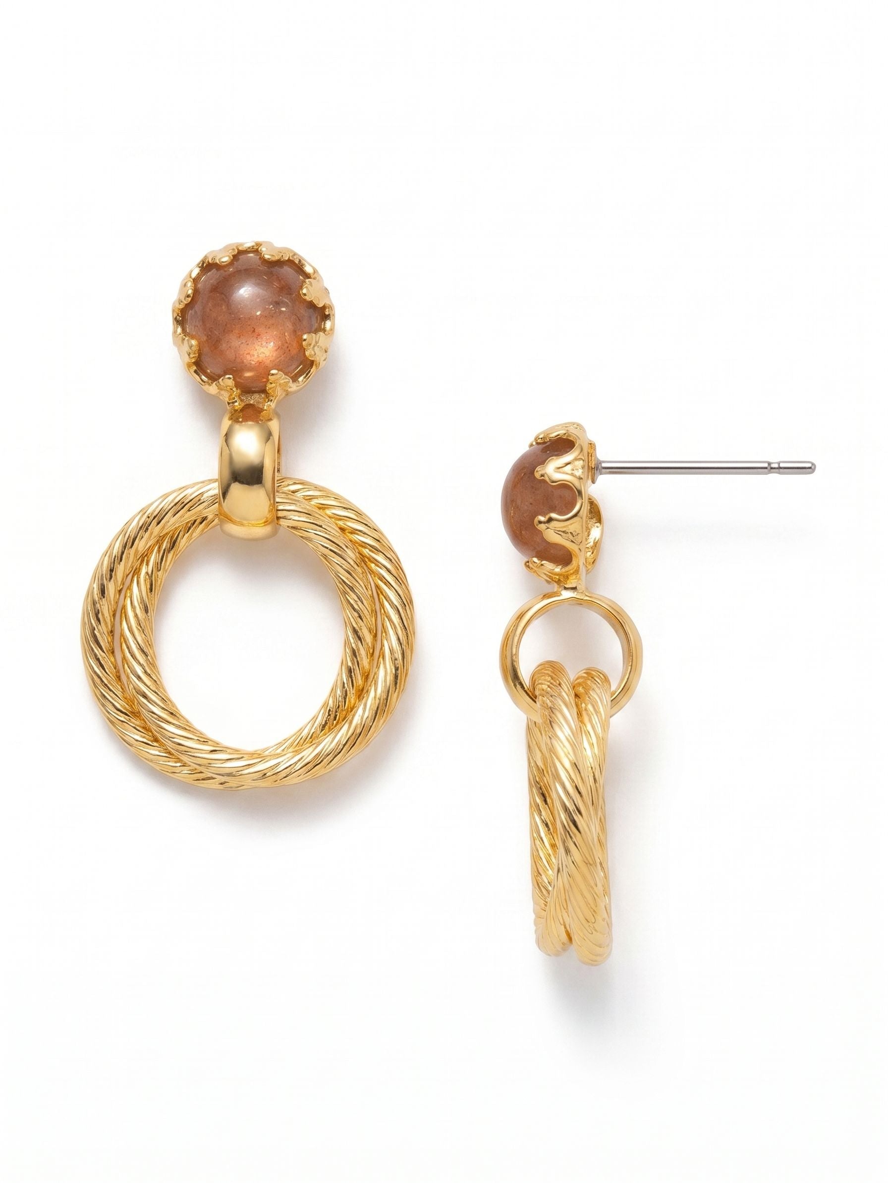 Odessa Dangle Earrings - EGI1BGSST - <p>A warm, round sunstone anchors this design, held closely within a detailed scalloped bezel. Below, a textured twisted gold ring swings freely to catch the light with your natural movement. The contrast between the smooth, earthy stone and the bright metal rope detailing brings a rich warmth to the face. These earrings feel substantial but wear easily, while the included oversized comfort back keeps the top setting secure and perfectly balanced through the day.</p><ul>
<li>Textural contrast between the smooth sunstone and twisted rope metalwork</li>
<li>Suspended metal ring design creates constant subtle movement</li>
<li>Post with oversized comfort-clutch back</li>
<li>Protective e-coat finish for lasting wear</li>
<li>Includes signature organza pouch for gifting and travel</li>
</ul>