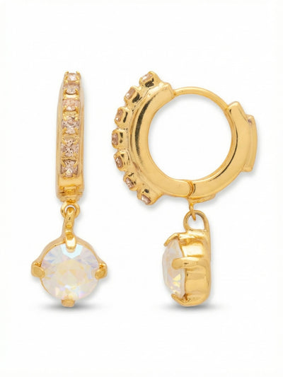 Crystal Stud Embellished Huggie Hoop Earrings - EGK1BGGGO - <p>A delicate take on the drop earring, this compact hoop rests securely while allowing the single round-cut crystal to catch the light. The front edge of the huggie is detailed with a fine rhinestone chain, adding a quiet layer of texture above the freely moving stone. The scale is intentional, offering the sway of a traditional drop with the close, comfortable wear of a daily staple. The iridescent flash of the stone warms beautifully against the bright gold setting.</p><ul>
<li>Rhinestone chain detailing along the front curve</li>
<li>Freely moving round-cut drop</li>
<li>Hinged hoop with click-shut closure</li>
<li>Protective e-coat finish for lasting wear</li>
<li>Includes signature organza pouch for gifting and travel</li>
</ul>