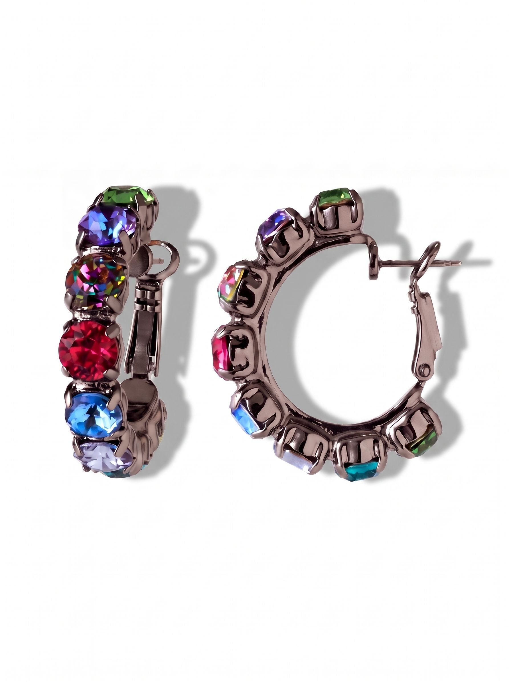 Jayda Hoop Earrings - EGL2GMNNI - <p>Deep gunmetal settings form a shadowed backdrop that makes the vibrant spectrum of round-cut crystals catch the light. At exactly an inch in length, these hoops bring a bold block of saturated color close to the face without feeling heavy or getting tangled in your hair. The secure lever back closure keeps the design comfortably anchored as you move through your day, bringing a confident pop of color to a familiar silhouette.</p><ul>
<li>Forward-facing round crystals display a vivid spectrum of seven contrasting colors</li>
<li>Substantial one-inch scale provides noticeable color without overpowering the face</li>
<li>Lever back closure for all-day secure wear</li>
<li>Includes organza pouch for gifting and travel</li>
</ul>