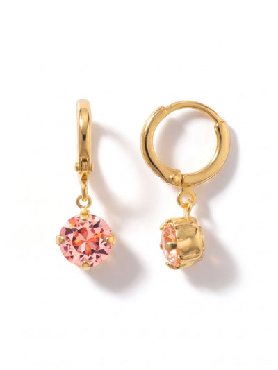 Crystal Stud Huggie Hoop Earrings - EGM1BGLTR - <p>A smooth gold-tone hoop hugs the ear closely, anchoring a single round-cut pink crystal. The hinged construction clicks securely into place, creating a comfortable fit built for daily wear. Suspended from a tiny ring, the light rose stone catches the light with every subtle movement, bringing a soft touch of color right near the face.</p><ul>
<li>Articulated setting allows the round-cut crystal to swing freely</li>
<li>Minimalist metal profile paired with a single faceted stone</li>
<li>Huggie hoop with click-shut closure</li>
<li>Protective e-coat finish for lasting wear</li>
<li>Includes organza pouch for gifting and travel</li>
</ul>