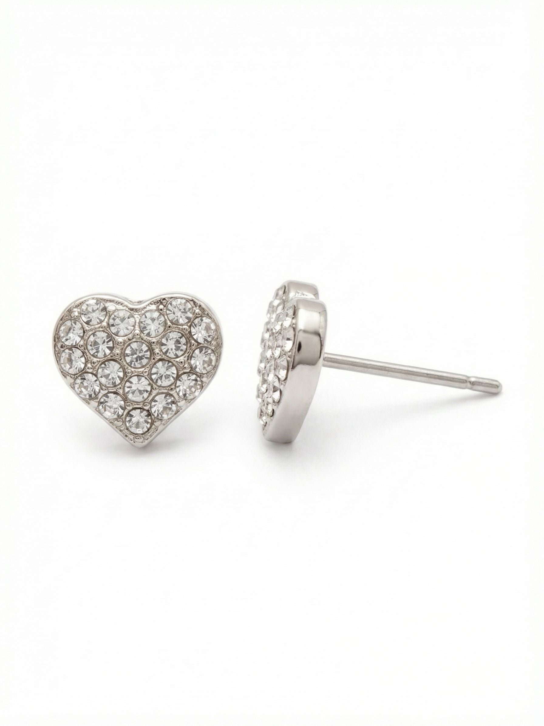 Mini Pave Heart Stud Earrings - ESP72PDCRY - <p>Thirty-eight tiny, round-cut crystals are tightly clustered to form a solid, shimmering surface in these quarter-inch studs. Up close, the precise pave construction is distinct, while from across a table, they simply read as clear, focused points of light. They sit comfortably flush against the ear for effortless daily wear. To ensure they stay perfectly positioned from morning until night, each pair includes our oversized monster back comfort clutches for a secure, supportive fit.</p><ul>
<li>Densely set micro crystals create an unbroken surface of light</li>
<li>Subtle silhouette designed to sit close and flush</li>
<li>Post with oversized comfort-clutch back</li>
<li>Protective e-coat finish for lasting wear</li>
<li>Includes signature organza pouch for gifting and travel</li>
</ul>