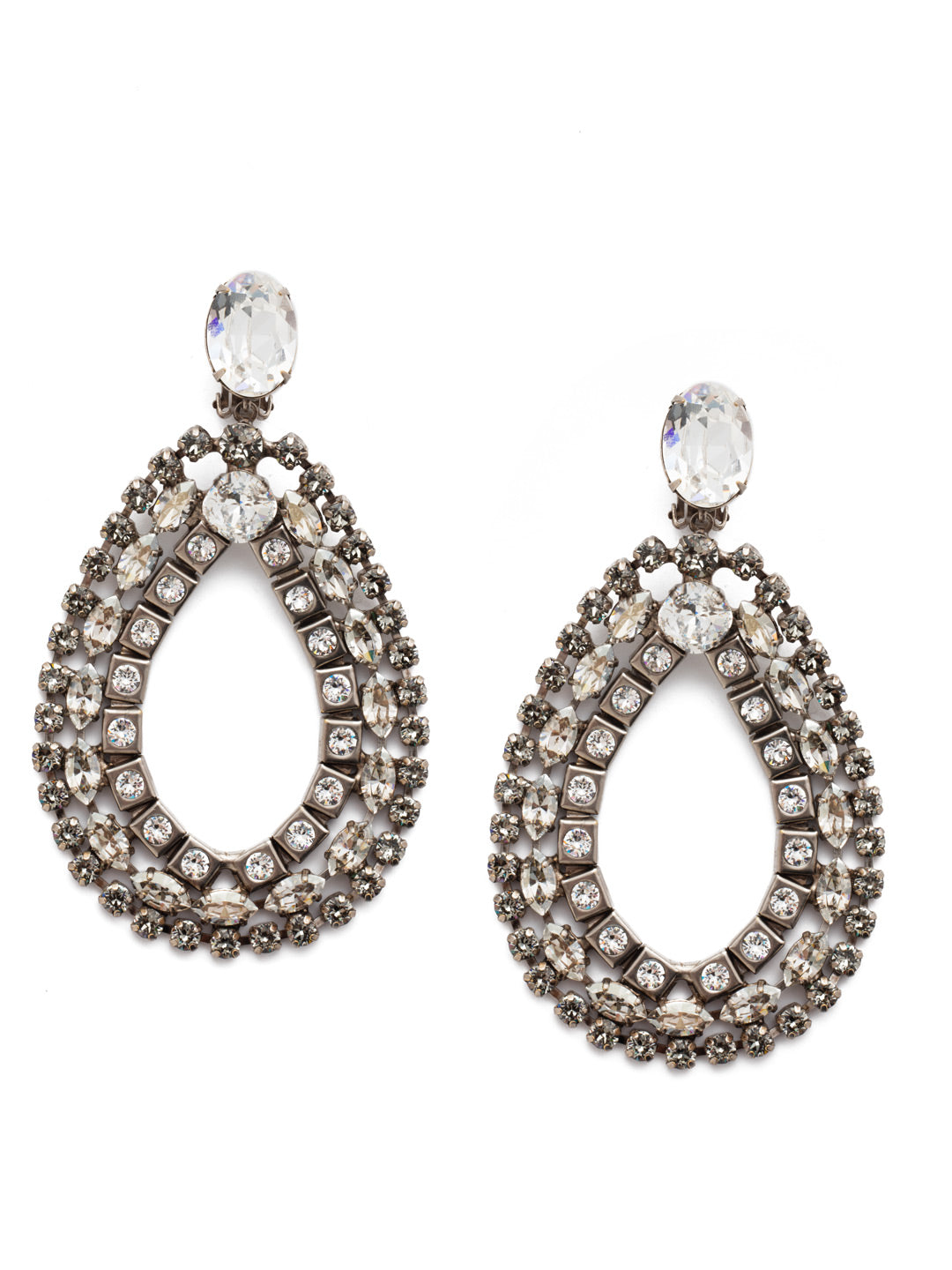 Alvian Statement Earrings - ESP74CASSSH - Looking for a perfect statement clip-op? Well look no further. The Alvian Statement Earrings dangle beautifully from an oval crystal. The layered design will be anything but subtle. From Sorrelli's Silver Shade collection in our Antique Silver-tone finish.
