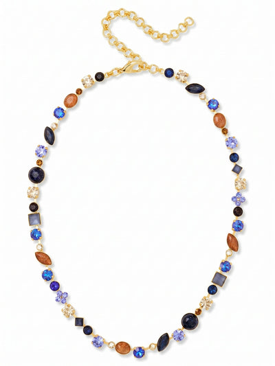 Classic Tee-Shirt Tennis Necklace - NAQ3BGDNM - <p>This mixed-shape tennis necklace reimagines the standard line of crystals into an eclectic, highly wearable piece. Deep, opaque blues from lapis and sodalite contrast with the faceted sparkle of warm sunstone and golden shadow crystals, creating a subtle visual rhythm along the collarbone. The flexible kette chain construction allows the stones to drape naturally and follow your movements throughout the day. With an adjustable length to dial in the exact drop, it brings a considered touch of color to a simple cotton tee or an open collar.</p><ul>
<li>Eclectic rhythm of square, oval, marquise, and round stones</li>
<li>Textural contrast between opaque lapis and faceted crystal elements</li>
<li>Lobster claw clasp</li>
<li>4-inch adjustable extension chain</li>
<li>Protective e-coat finish for lasting wear</li>
<li>Includes signature organza pouch for gifting and travel</li>
</ul>