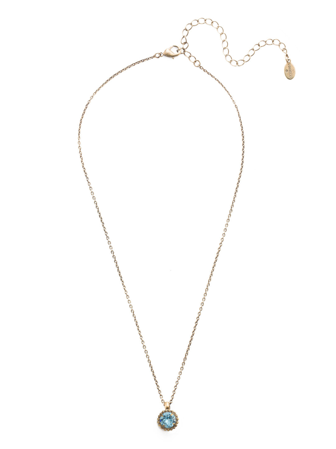 Simplicity Pendant Necklace - NBY38AGAQU - <p>Perfect for any day! The Simplicity Pendant Necklace features a round cut crystal with vintage edging. From Sorrelli's Aquamarine collection in our Antique Gold-tone finish.</p>
