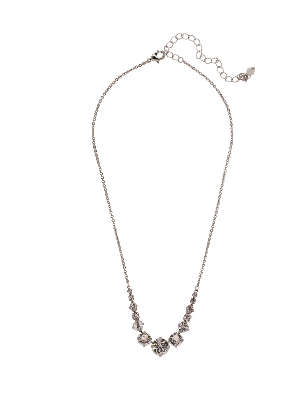London Tennis Necklace - NCQ14RHCRY - <p>A long, simple chain paired with gorgeous round stones is exactly what every girl needs to dress things up. This round stone necklace is perfect for layering, or to just wear alone. Let the simple sparkle take over. From Sorrelli's Crystal collection in our Palladium Silver-tone finish.</p>