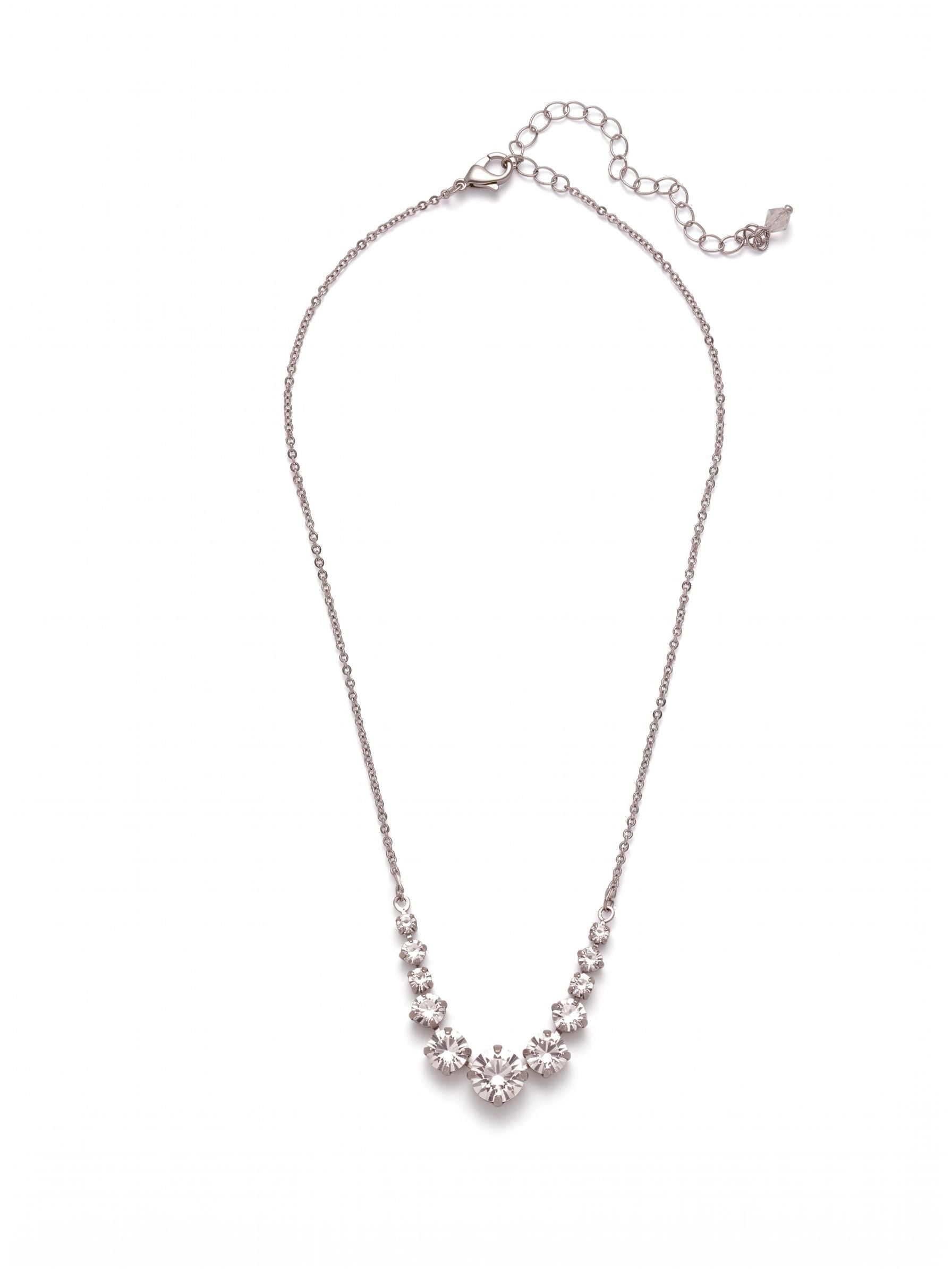 London Tennis Necklace - NCQ14RHCRY - <p>A long, simple chain paired with gorgeous round stones is exactly what every girl needs to dress things up. This round stone necklace is perfect for layering, or to just wear alone. Let the simple sparkle take over. From Sorrelli's Crystal collection in our Palladium Silver-tone finish.</p>