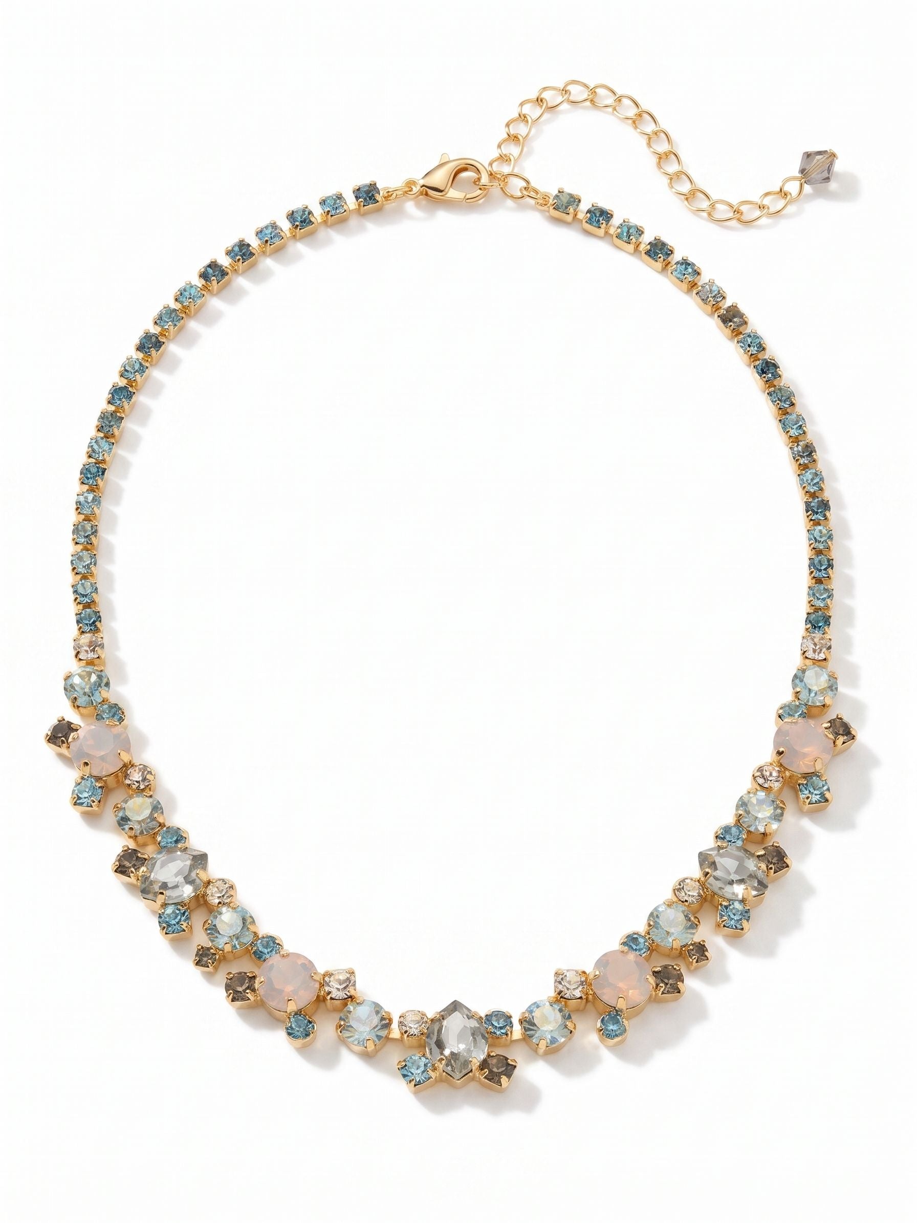 Perfect Harmony Line Tennis Necklace - NDK11BGLBH - <p>This classic line necklace features stations of crystal clusters alternating between round cut and pear shaped central stones, blending in perfect harmony! A rhinestone chain completes this design with all around sparkle. From Sorrelli's Laguna Beach collection in our Bright Gold-tone finish.</p>