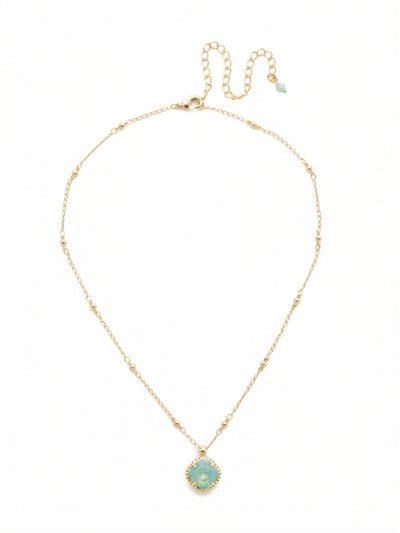 Cushion-Cut Pendant Necklace - NDS50BGPAC - <p>A single cushion-cut crystal acts as a quiet focal point at the collarbone. The pale, milky green of the Pacific Opal catches the light subtly, framed by a textured setting that adds a hint of character to the profile. It is suspended from a delicate cable chain punctuated by tiny, evenly spaced beads, giving the strand a gentle rhythm. With an adjustable extension, you can easily shift the placement to anchor a layered neckline or let it stand alone.</p><ul>
<li>Delicate cable chain punctuated by evenly spaced bead stations</li>
<li>Single cushion-cut crystal suspended in a subtly textured frame</li>
<li>Lobster claw clasp</li>
<li>4-inch adjustable extension chain</li>
<li>Protective e-coat finish for lasting wear</li>
<li>Includes signature organza pouch for gifting and travel</li>
</ul>