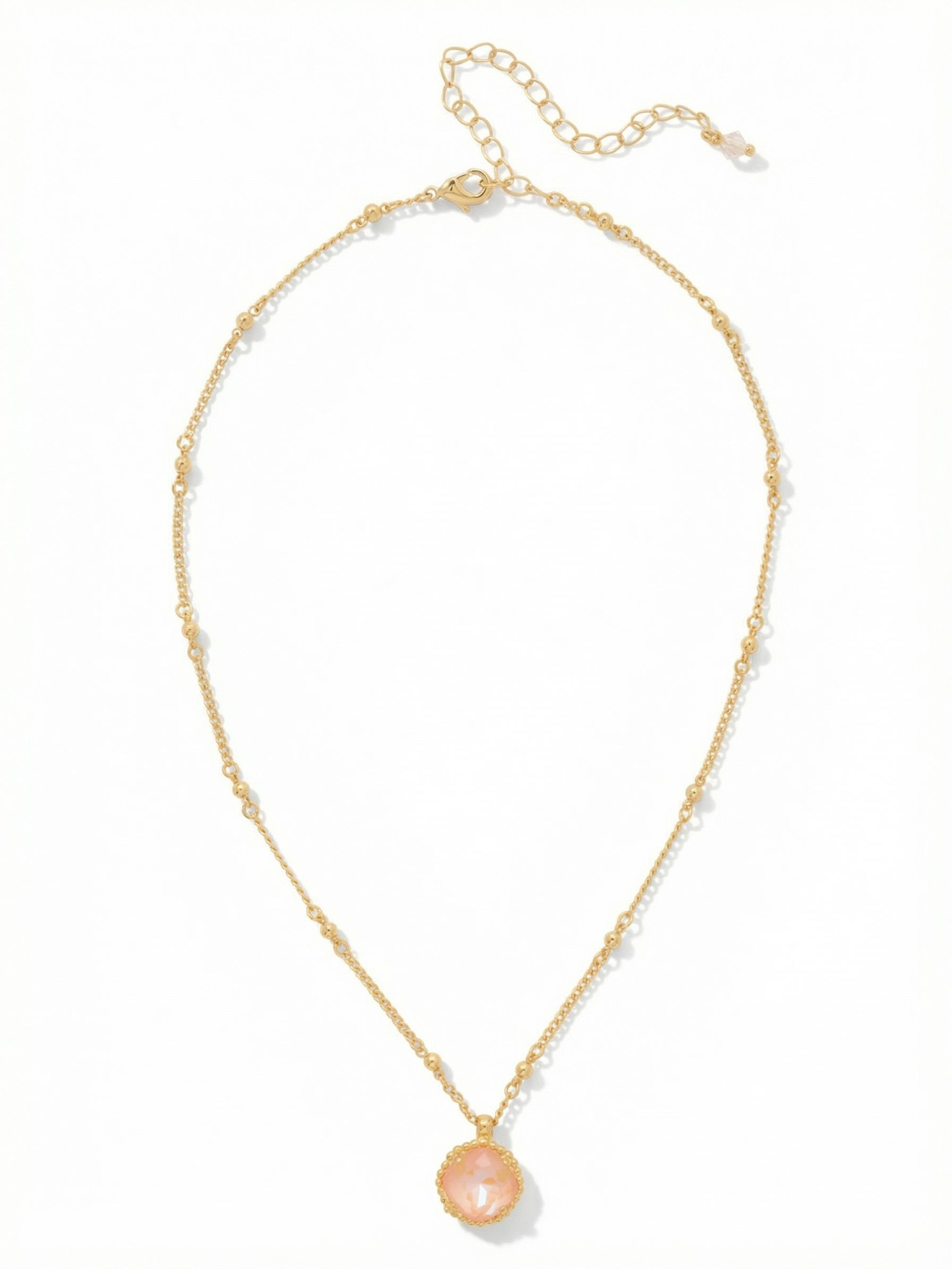 Cushion-Cut Pendant Necklace - NDS50BGPD - <p>A single warm crystal catches the light at your collarbone, anchored by a chain that offers its own quiet texture. The alternating ball and cable links bring a subtle rhythm to the piece, elevating a simple pendant into something more deliberate. With an adjustable length, it rests exactly where you want it, working just as easily layered over a crewneck sweater as it does resting against bare skin.</p><ul>
<li>Textured alternating ball and cable chain construction</li>
<li>Warm 12mm cushion-cut crystal anchored in a scalloped bezel</li>
<li>Lobster claw clasp</li>
<li>4-inch adjustable extension chain</li>
<li>Protective e-coat finish for lasting wear</li>
<li>Includes signature organza pouch for gifting and travel</li>
</ul>