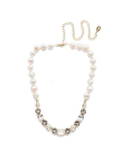 Cadenza Tennis Necklace - NEC14BGCRY - <p>This classic beauty features a chain of wire-wrapped freshwater pearls supporting a delicate pattern of crystal shapes at its base. From Sorrelli's Crystal collection in our Bright Gold-tone finish.</p>