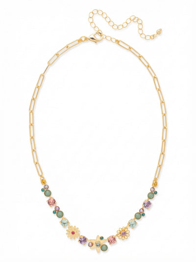 Meadow Tennis Necklace - NEV130BGCPO - <p>Bright gold paperclip links offer a sleek contrast to the botanical cluster resting at the collarbone. The front-facing design transitions from polished chain into an asymmetrical gathering of metal blooms and round-cut crystals in soft violet, pacific opal, and aquamarine. Sitting high on the neck, this piece provides a focal point of varied pastel light. It easily anchors a layered look, while the extension chain allows you to adjust the placement exactly where you want it.</p><ul>
<li>Asymmetrical mix of pastel stones and metal floral motifs</li>
<li>Modern open paperclip chain construction</li>
<li>Lobster claw clasp</li>
<li>4-inch adjustable extension chain</li>
<li>Protective e-coat finish for lasting wear</li>
<li>Includes signature organza pouch for gifting and travel</li>
</ul>