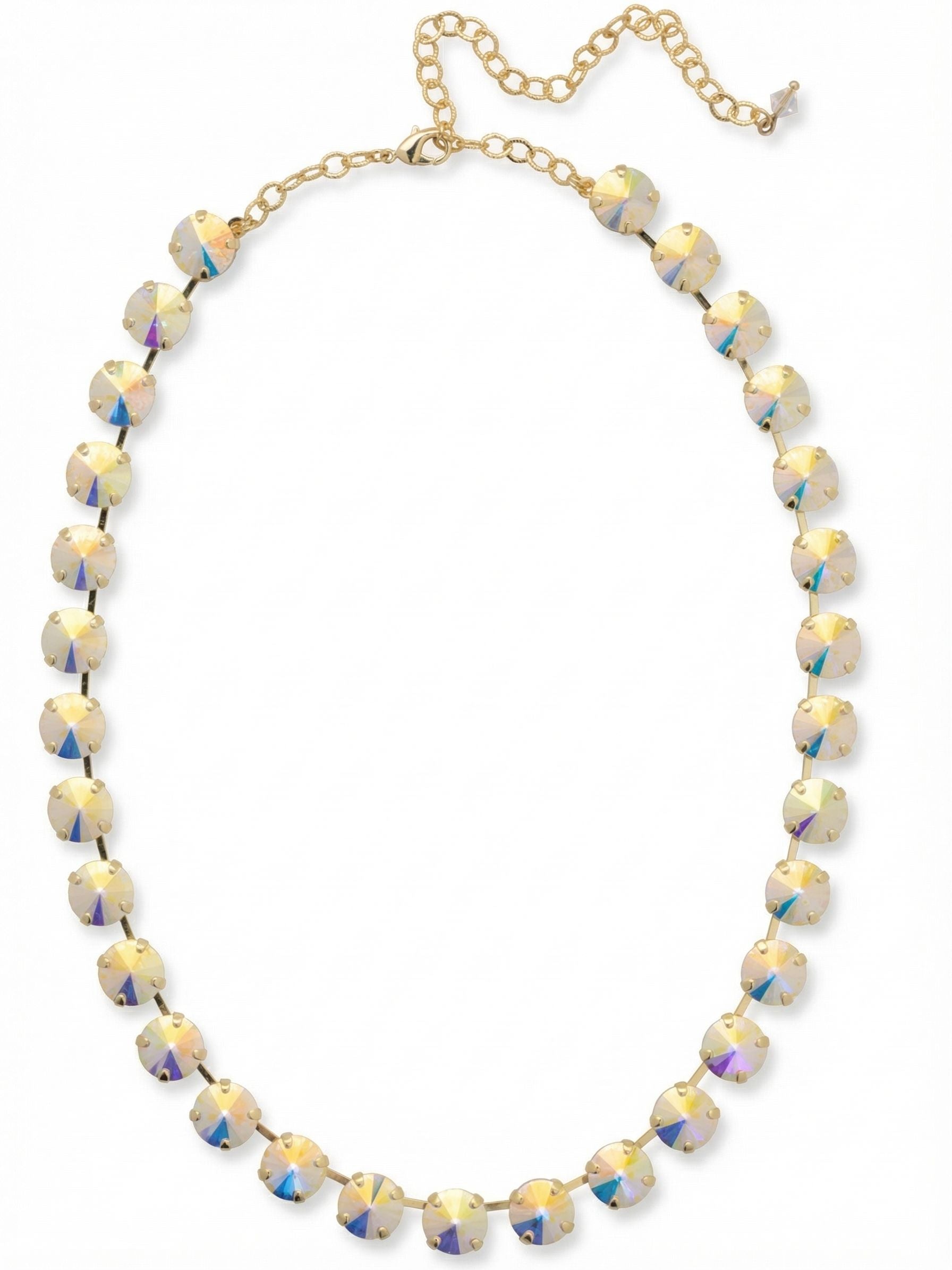 Mara Tennis Necklace - NFD75BGCAB - <p>The Mara Tennis Necklace is a perfect blend of classic elegance and contemporary style! This stunning piece showcases a full line of rivoli cut crystals, instantly drawing attention. (16-20 inches) From Sorrelli's Crystal Aurora Borealis collection in our Bright Gold-tone finish.</p>