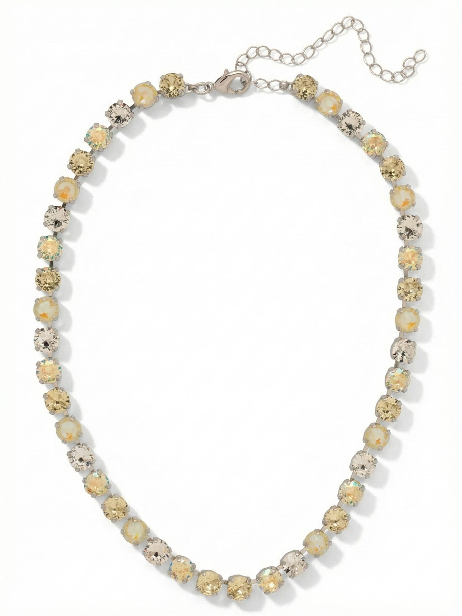 Matilda Tennis Necklace - NFJ4PDLZ - <p>The Matilda Tennis Necklace features a repeating line of round cut crystals on an adjustable chain, secured with a lobster claw clasp. (16-20 inches)</p>