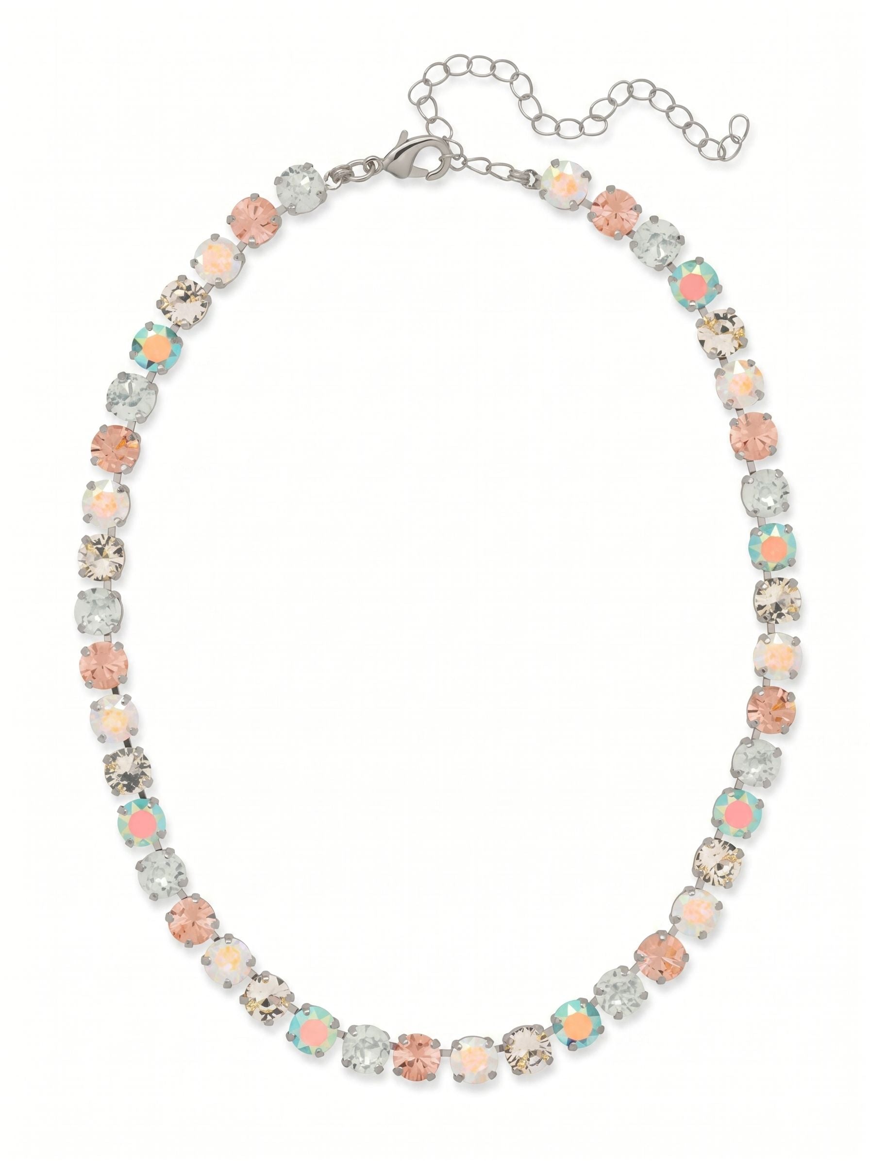 Matilda Tennis Necklace - NFJ4PDRQ - <p>The Matilda Tennis Necklace creates an unbroken line of soft prismatic light across the collarbone. Set in cool palladium, round-cut crystals in washed pastels like vintage rose, light azore, and air blue opal transition seamlessly along the fluid channel chain. This classic kette construction ensures the piece drapes naturally and keeps the stones facing outward as you move. An included extension chain allows you to tailor the drop exactly to your neckline, making this subtle wash of color a deliberate addition to your daily uniform.</p><ul>
<li>Fluid kette chain construction allows the continuous line of stones to drape naturally</li>
<li>Alternating round-cut pastel crystals create a subtle prismatic color progression</li>
<li>Lobster claw clasp</li>
<li>4-inch adjustable extension chain</li>
<li>Protective e-coat finish for lasting wear</li>
<li>Includes signature organza pouch for gifting and travel</li>
</ul>