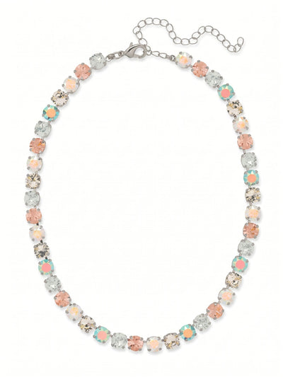 Matilda Tennis Necklace - NFJ4PDRQ - <p>The Matilda Tennis Necklace creates an unbroken line of soft prismatic light across the collarbone. Set in cool palladium, round-cut crystals in washed pastels like vintage rose, light azore, and air blue opal transition seamlessly along the fluid channel chain. This classic kette construction ensures the piece drapes naturally and keeps the stones facing outward as you move. An included extension chain allows you to tailor the drop exactly to your neckline, making this subtle wash of color a deliberate addition to your daily uniform.</p><ul>
<li>Fluid kette chain construction allows the continuous line of stones to drape naturally</li>
<li>Alternating round-cut pastel crystals create a subtle prismatic color progression</li>
<li>Lobster claw clasp</li>
<li>4-inch adjustable extension chain</li>
<li>Protective e-coat finish for lasting wear</li>
<li>Includes signature organza pouch for gifting and travel</li>
</ul>