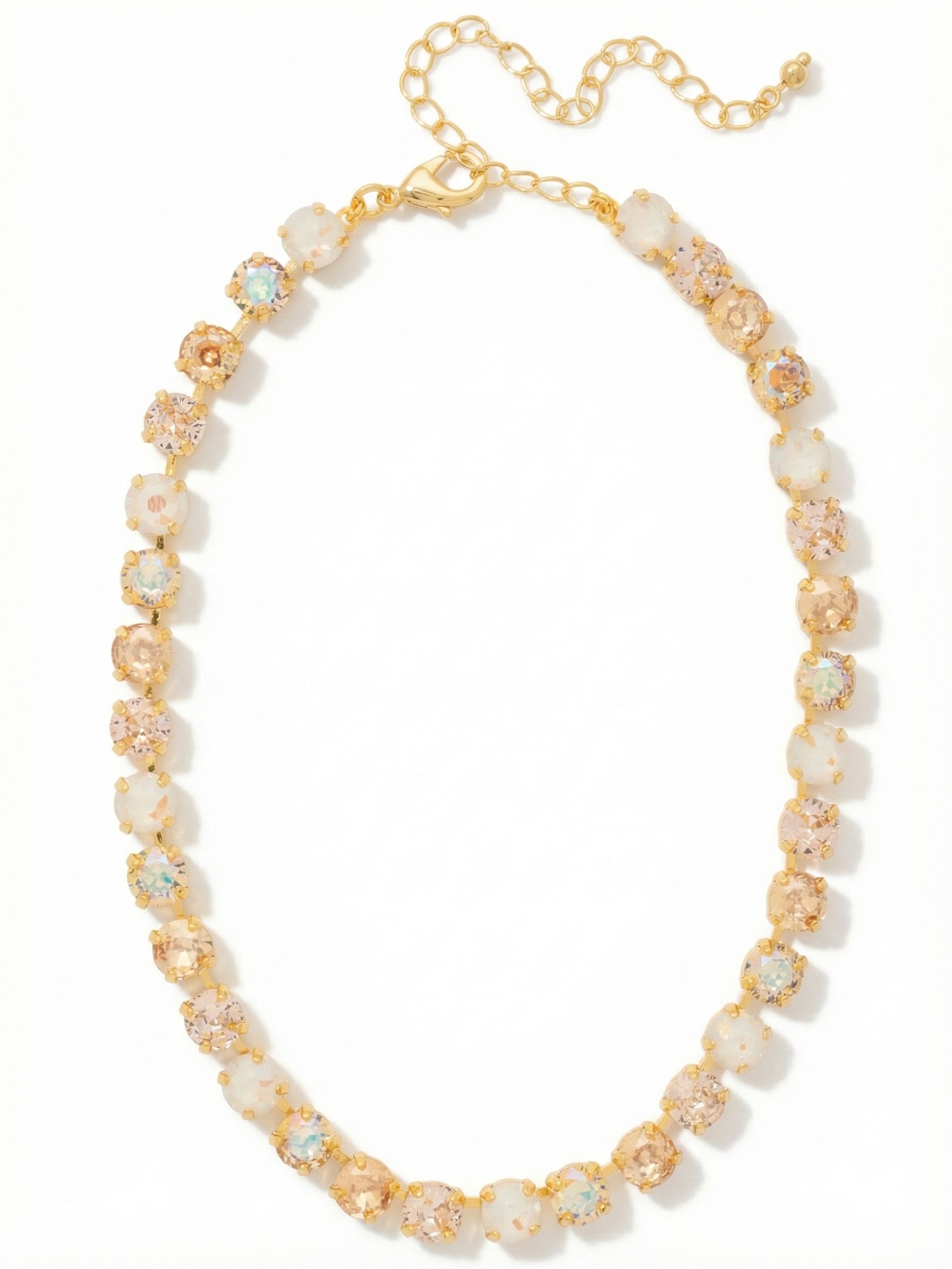 Matilda Choker Necklace - NFJ80BGGGO - <p>A continuous sweep of round crystals circles the neck in a rhythm of pale gold, vintage rose, and iridescent white. The channel chain construction allows the stones to move fluidly with your collarbone, catching light evenly from all angles. An extension chain lets you adjust the drape, whether you prefer it close to the throat as a solo piece or relaxed slightly to anchor a layered stack. It brings a gentle, warm light to the skin without feeling heavy.</p><ul>
<li>Continuous channel-set chain construction for a fluid and flexible fit</li>
<li>A soft palette of champagne, vintage rose, and iridescent round crystals</li>
<li>Lobster claw clasp</li>
<li>4-inch adjustable extension chain</li>
<li>Protective e-coat finish for lasting wear</li>
<li>Includes signature organza pouch for gifting and travel</li>
</ul>