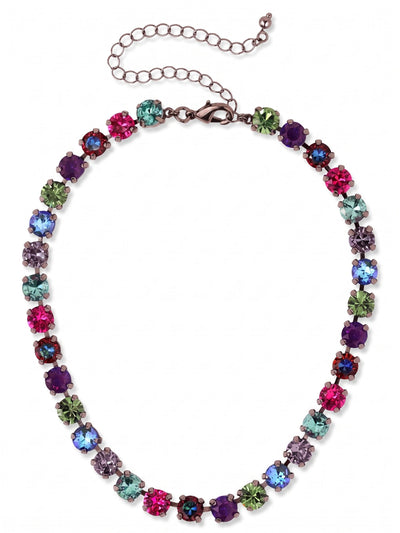 Matilda Choker Necklace - NFJ80GMNNI - <p>The Matilda Choker frames the collarbone in a dense line of saturated jewel tones. Set in an articulated channel chain, uniformly sized round crystals catch the ambient light, flashing deep magentas, vibrant teals, and stormy purples that echo a midnight nebula. This fluid construction allows the necklace to drape naturally, shifting as you move. An integrated extension chain lets you dictate the precise fit, adjusting easily from a close collar to a slightly relaxed drape to anchor a layered stack.</p><ul>
<li>Articulated channel chain that drapes fluidly</li>
<li>Alternating rhythm of saturated jewel-toned round crystals</li>
<li>Lobster claw clasp</li>
<li>4-inch adjustable extension chain</li>
<li>Includes signature organza pouch for gifting and travel</li>
</ul>