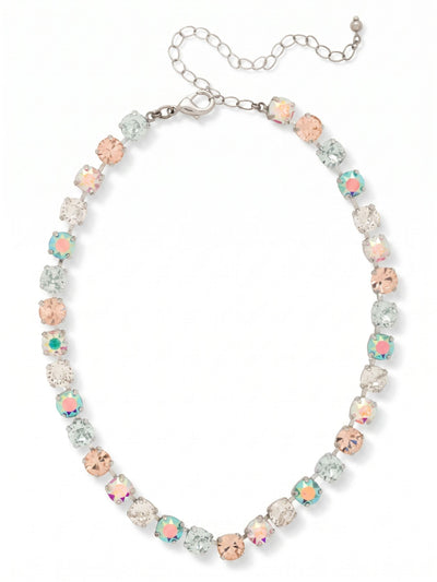 Matilda Choker Necklace - NFJ80PDRQ - <p>A continuous line of round cut crystals rests closely along the collarbone, anchored by a traditional kette chain construction that fluidly follows your movements. The color palette shifts softly in the light, blending clear crystals with gentle tones of pale rose and light azore. Stones treated with an aurora borealis finish catch subtle prismatic reflections as the necklace turns. An included extension chain allows you to adjust the drop, making it easy to position this piece exactly where it feels right over an open neckline or layered with longer chains.</p><ul>
<li>Alternating pastel and iridescent round cut crystals</li>
<li>Traditional kette chain construction for a fluid drape</li>
<li>Lobster claw clasp</li>
<li>4-inch adjustable extension chain</li>
<li>Protective e-coat finish for lasting wear</li>
<li>Includes signature organza pouch for gifting and travel</li>
</ul>